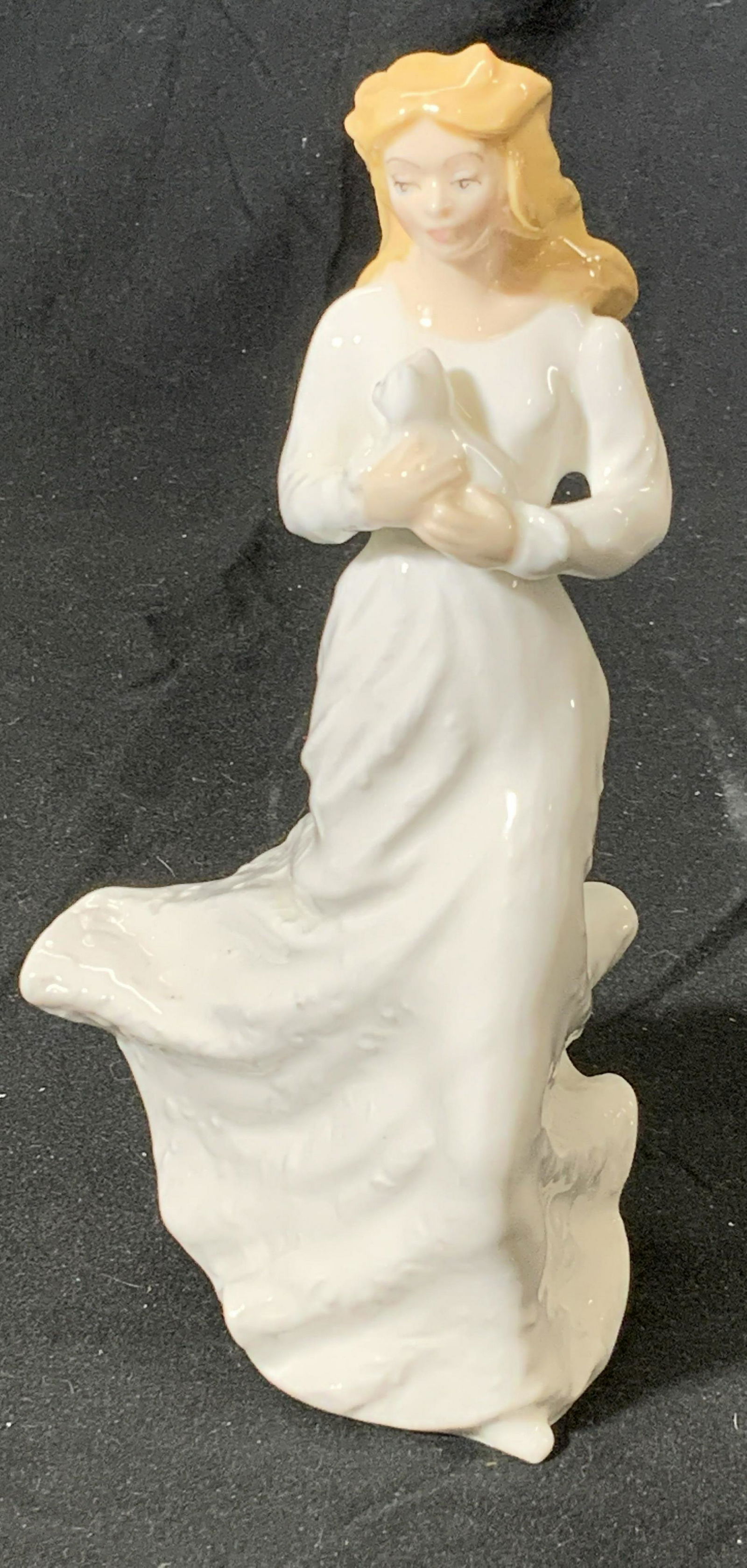 ROYAL DOULTON Bone China Loving You Figurine: Vintage ROYAL DOULTON bone china figurine. Titled Loving You, female figure holding dog. Signed to underside. Vintage 1991. In good condition. Measures approx. 6 x 3.5 inches. Property of Palm Beach,