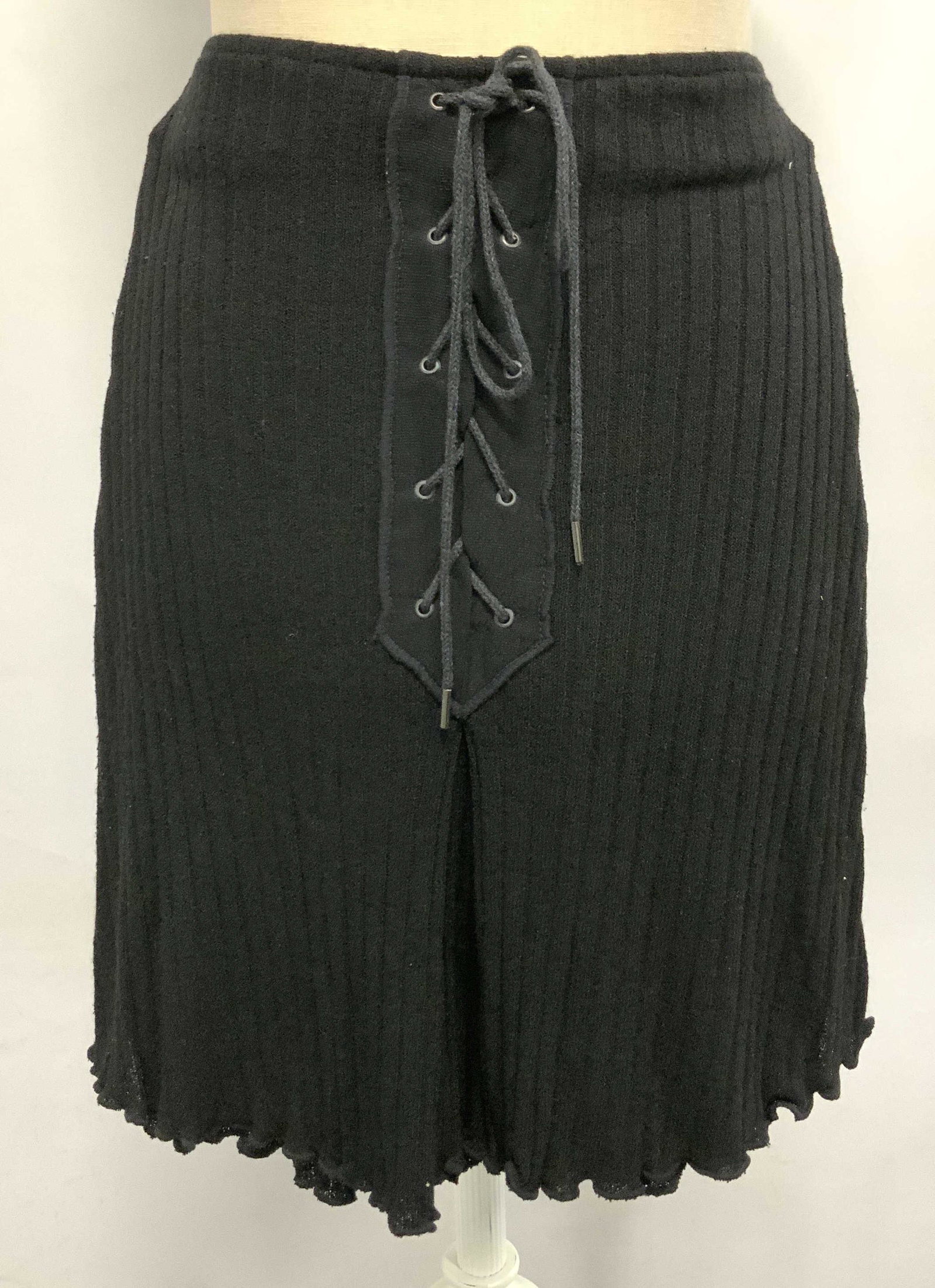 Atsuro Toyama Stretch Waist Skirt, France: Ribbed black skirt, rayon and nylon with stretch waist band. Size 8. Garment made in France, signed designer Label Atsuro Toyama, semi sheer fabric, 20 in. Long. Made in France clothing, Signed Atsuro