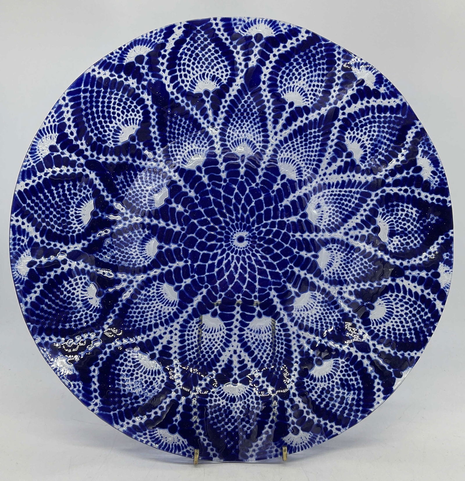 SYDENSTRIKER Signed Glass Plate: SYDENSTRIKER Signed Glass Plate, inscription reads ‘Syd’, blue patterned dish with ruffled lip, measures 13 3/4 inches in diameter, surface wear to piece, Property of Palm Beach Estate, SYDENSTRIK