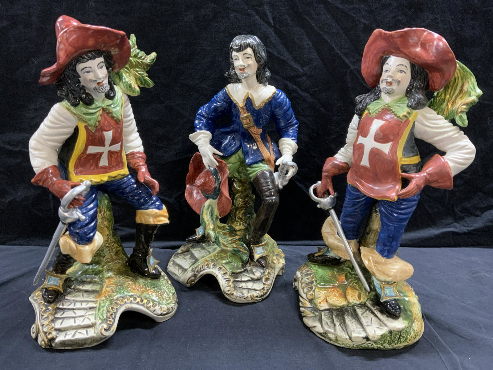 CAPODIMONTE Italy Three Musketeers Figurals: CAPODIMONTE Hand Painted Porcelain Three Musketeers, underside of Figurals read CAPODIMONTE MADE IN ITALY, largest measures approx 8 1/2 inches wide x 17 inches tall. CAPODIMONTE, CAPODIMONTE Figurals