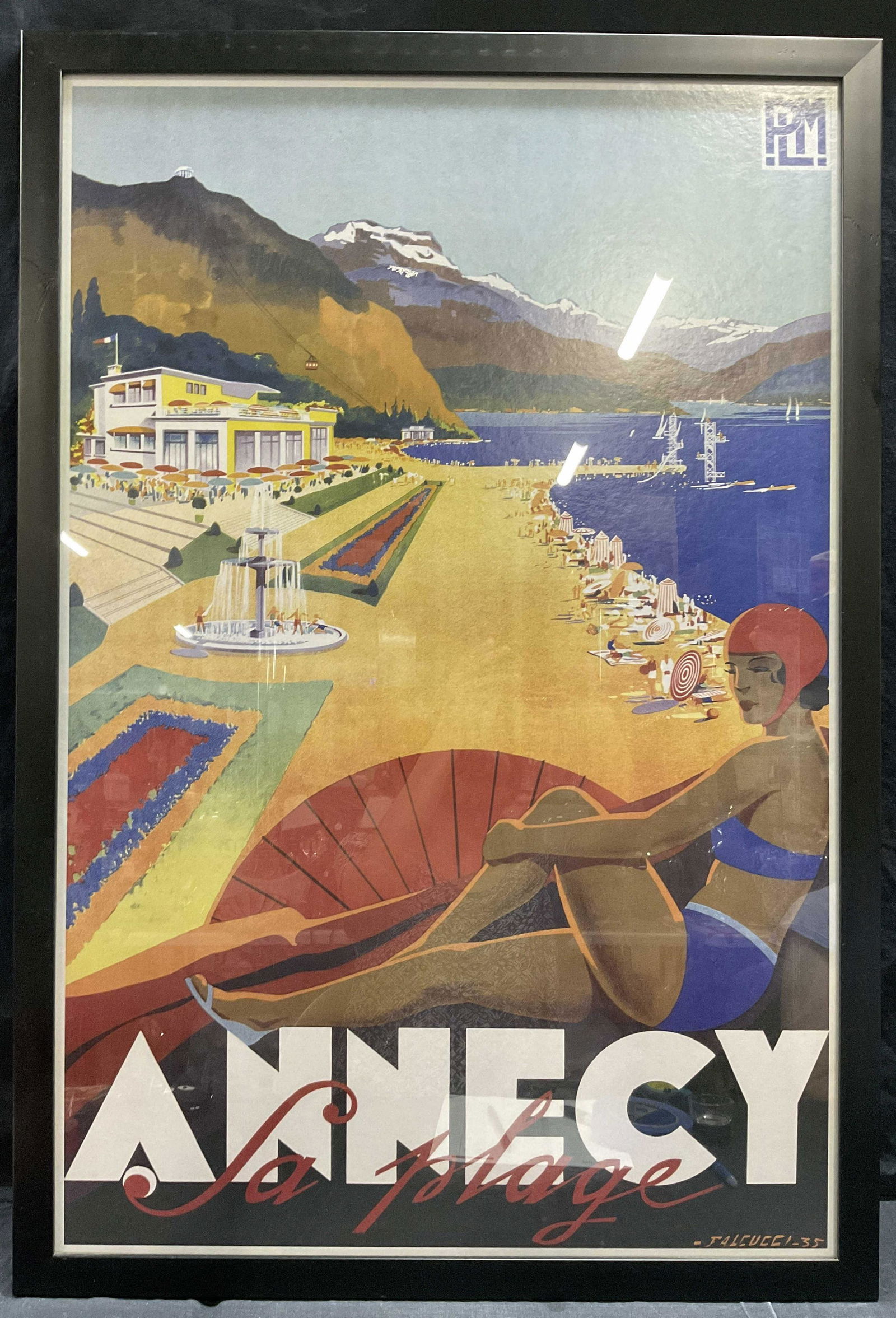 ROBERT FALCUCCI Annecy Offset Lithograph: ROBERT FALCUCCI Annecy Offset Lithograph, inscriptions read PLM, Annecy La plage, FALCUCCI 35, subject a woman alongside a beach and mountain range, measures 38 x 26 inches, black composite frame, sur