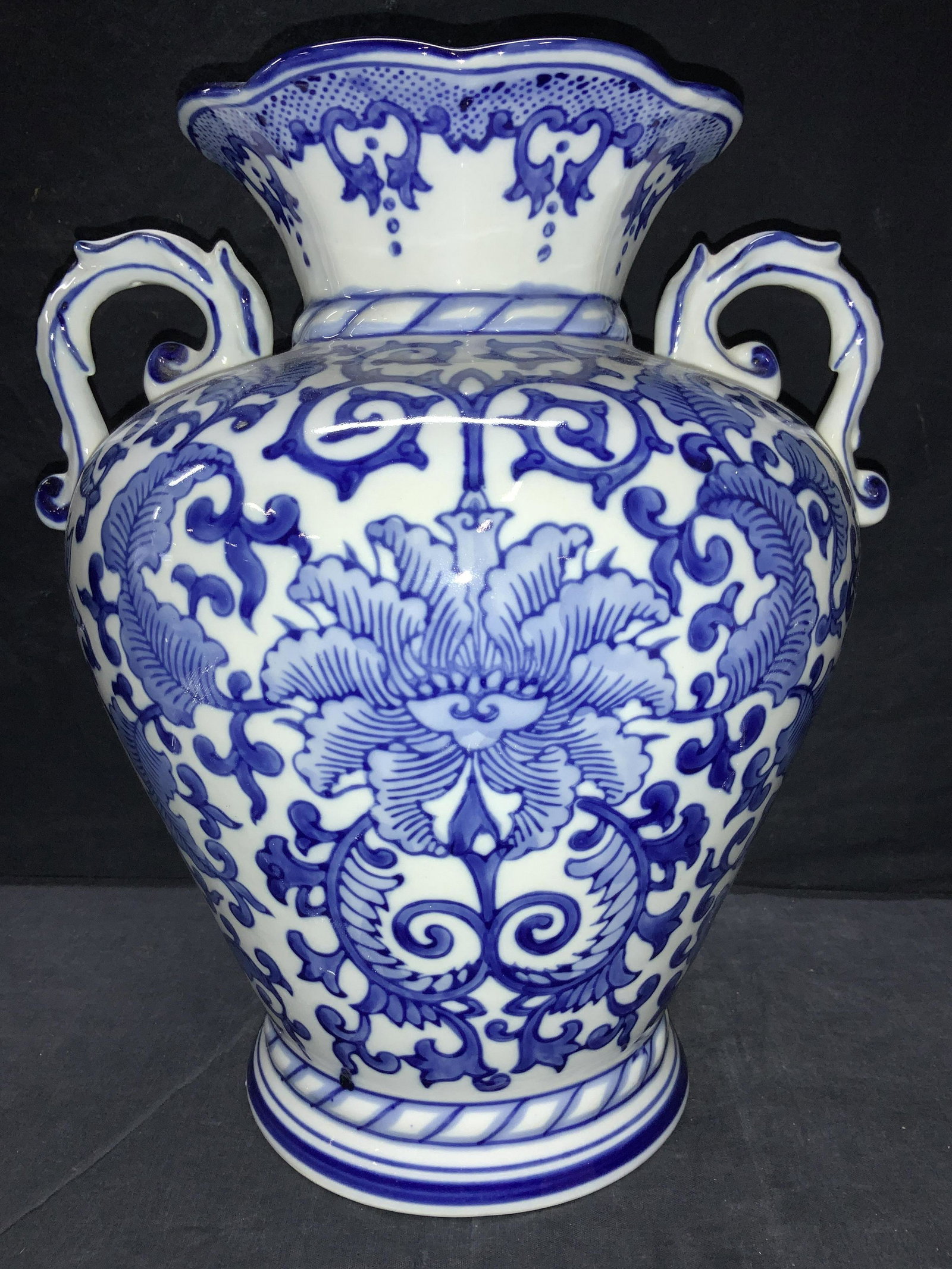 Seymour Mann Blue & White Porcelain Vase sgn: Collectible blue and white porcelain vase with curved handles, depicts fauna, butterflies and Leiwen patterns built into Laurel motif. Signed on underside, reads ‘China Blue Fine Porcelain Exclusive