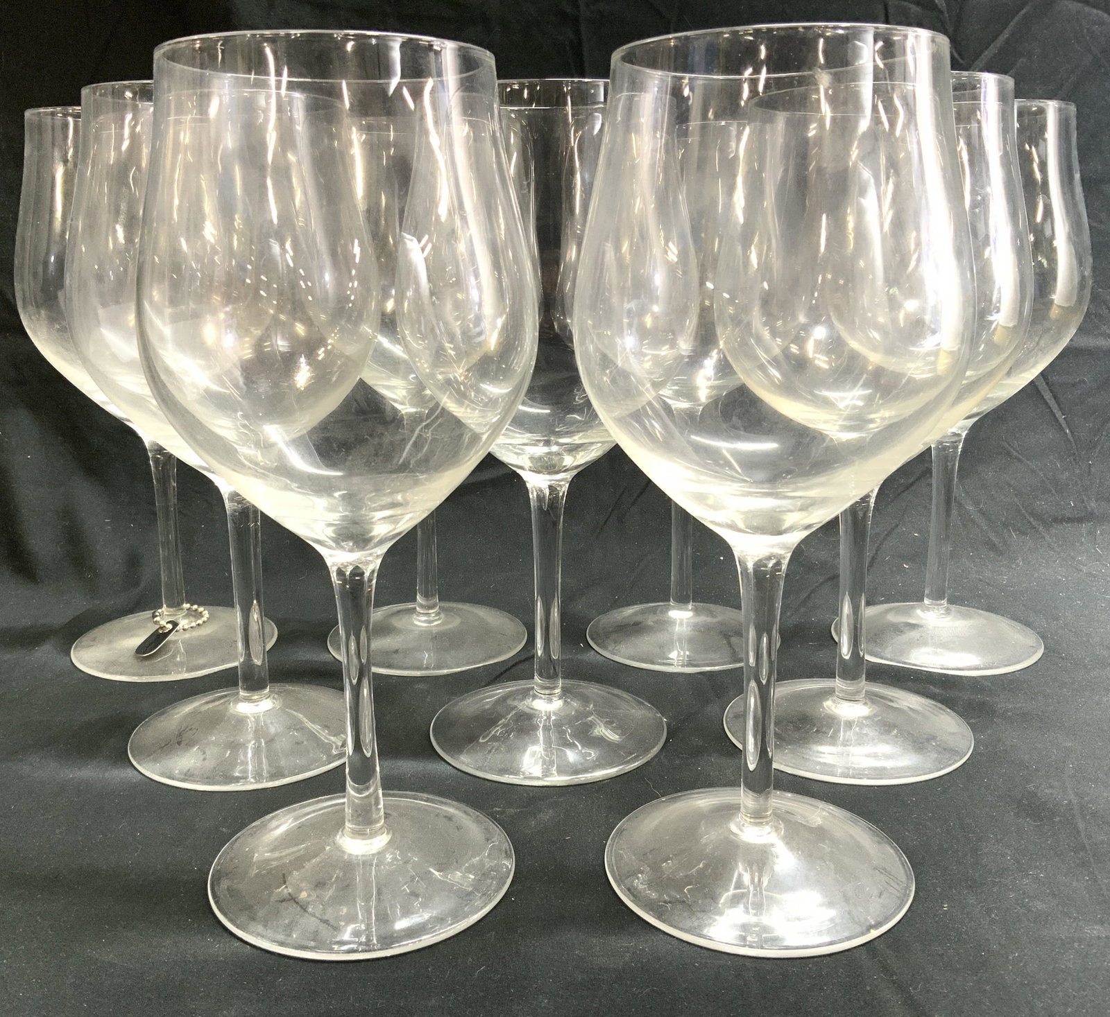 Lot 9 Glass Stemware: Lot includes 9 stemware glasses. Each measure approx 9.75 inches tall 4.5 inches wide. Stemware, glassware, group lot stemware, Barware, beverage ware, wine glasses. 6