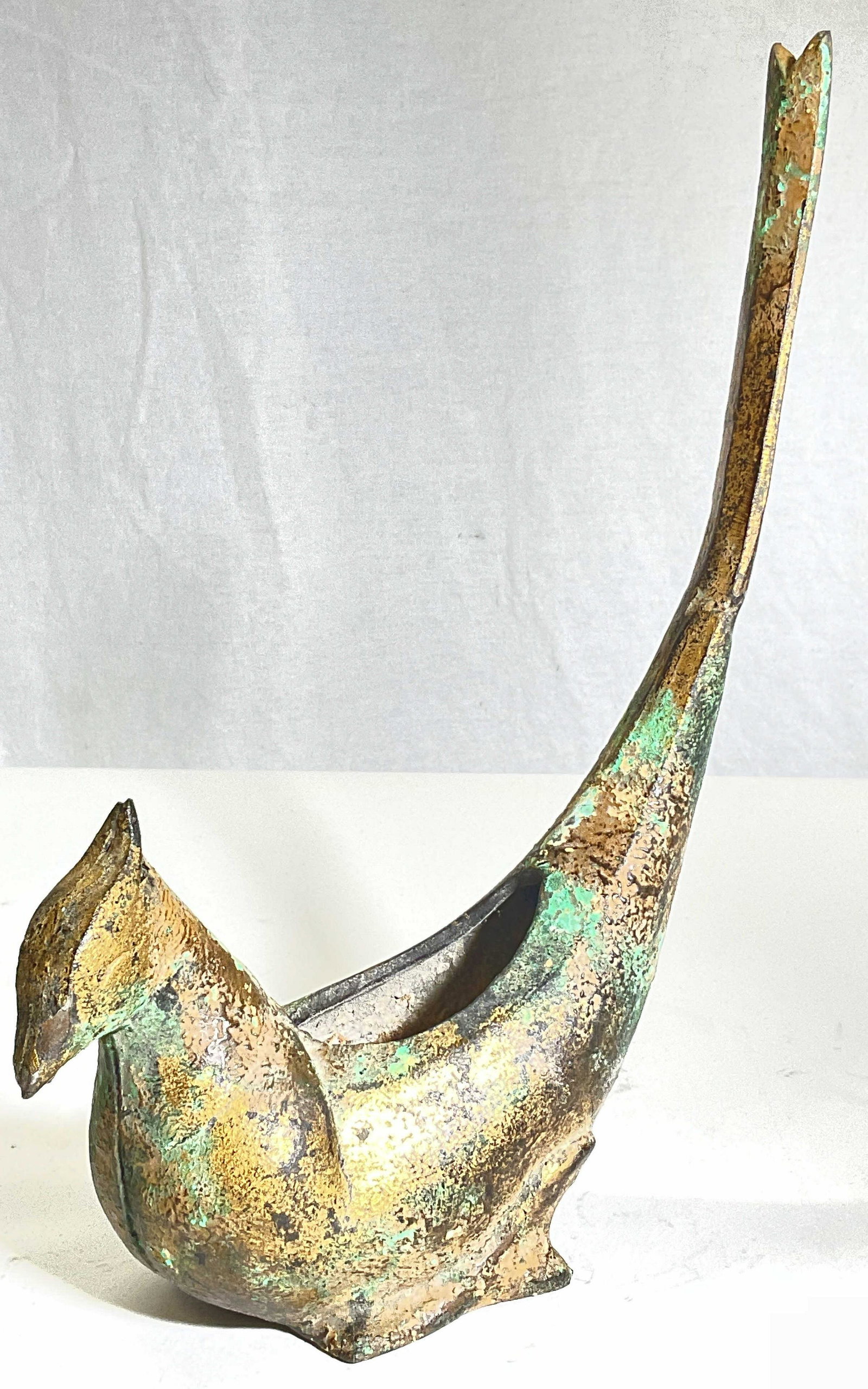 Iron Incense Burner Bird: Iron incense burner bird. Abstract looking bird with gold, green and black tones to metal. Measures 7x 9 inches, weight to piece. Surface wear consistent with age and use. Property of Palm Beach, FL e