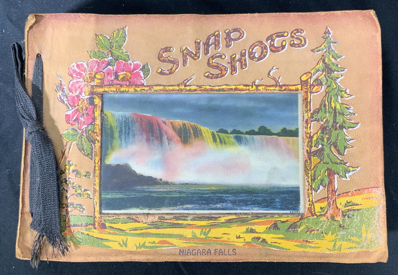 Retro Niagara Falls Vacation Keepsake Album: A vintage 1951 Niagara Falls keepsake photo album. In vintage condition consistent with ge, use, and exposure. Album includes photographs, colored images of Niagara Falls, and travel ephemera. Measure
