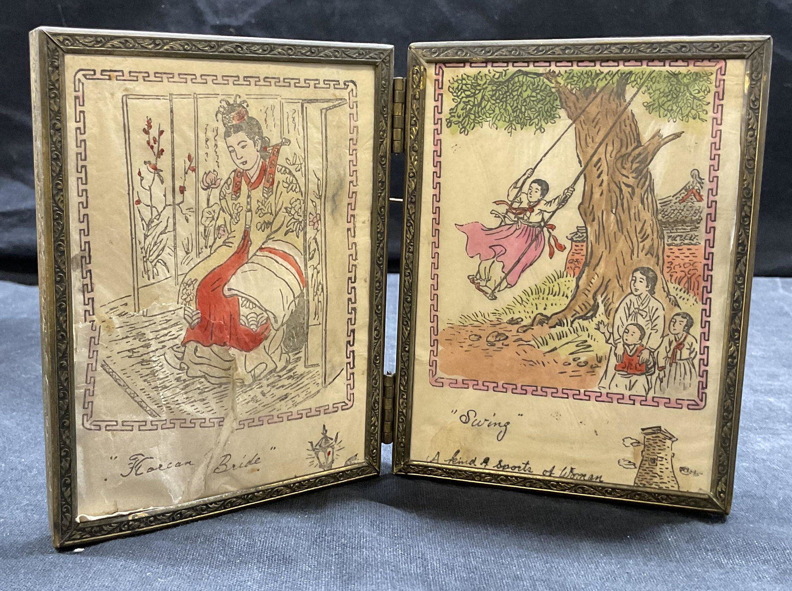 Hand Colored Korean Woodcut Diptych: Hand Colored Korean Woodcut Diptych, inscriptions read Korean Bride and Swing a kind sports of woman, each measures 4 1/2 inches tall x 3 3/8 inches, figures in traditional Korean hanbok, one piece is