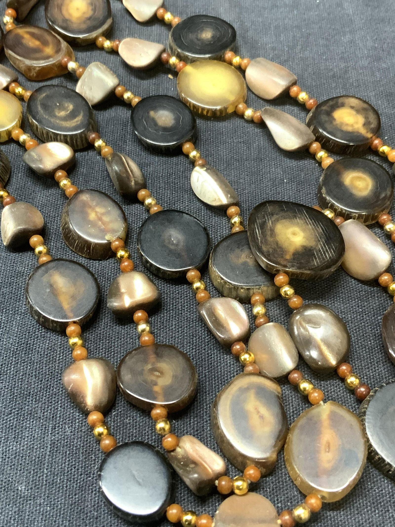 Bohemian Calico Beaded Strand: Bohemian Calico Beaded Strand, broken off clasp, in need of repair or can be upcycled/converted, strand measures approx 47 in. long. Bohemian calico beaded necklace, body jewelry, upcycle belt, vintag