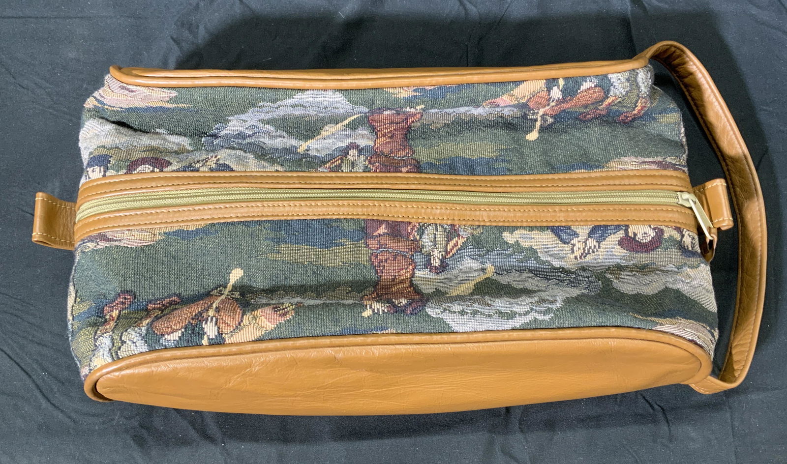 MEMBERS CARE Vintage Tapestry Travel Bag: Members Care vintage tapestry bag with golf motif. Zippered closure with top handle. Good vintage condition, creasing to trim. Measures approx. 14L x 8.5W x 4.5H inches. Members care, tapestry bag, go