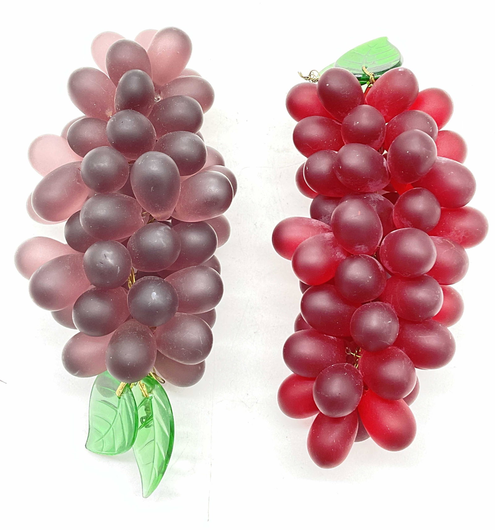 Pair Frosted Purple & Red Art Glass Grapes: Pair Frosted Purple & Red Art Glass Grapes. Measures approx 6 inches in length. Made of glass and wire. Weight to piece. Surface wear consistent with age and use. Property of Palm Beach FL Estate Grap
