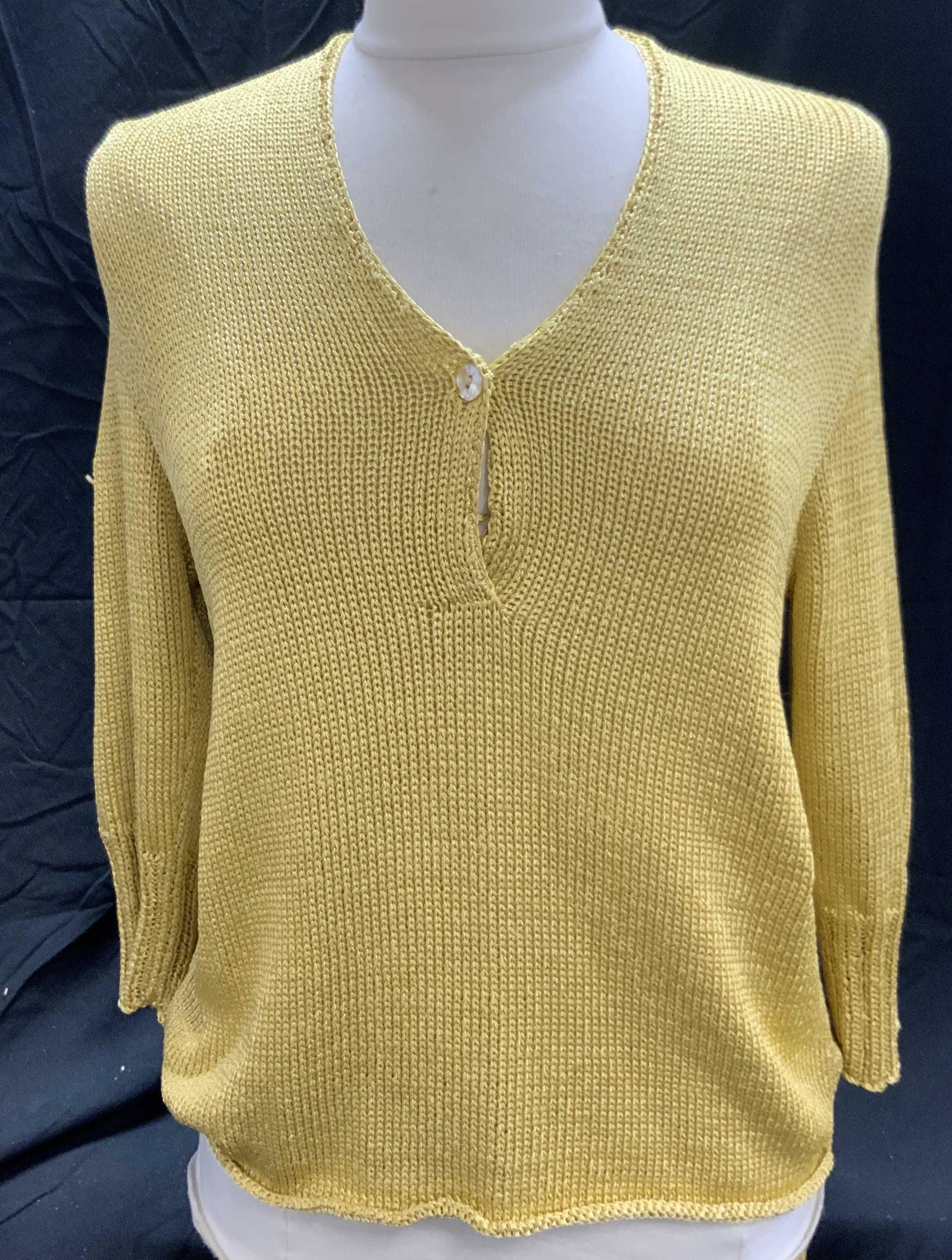 BALL OF COTTON Yellow Knit Long Sleeve Sweater: BALL OF COTTON long sleeve loose knit v neck sweater in mustard yellow. Size M. 100% Tactel polyamide. Gently worn. BALL OF COTTON is a premium luxury knitwear brand made and based in Los Angeles, CA 