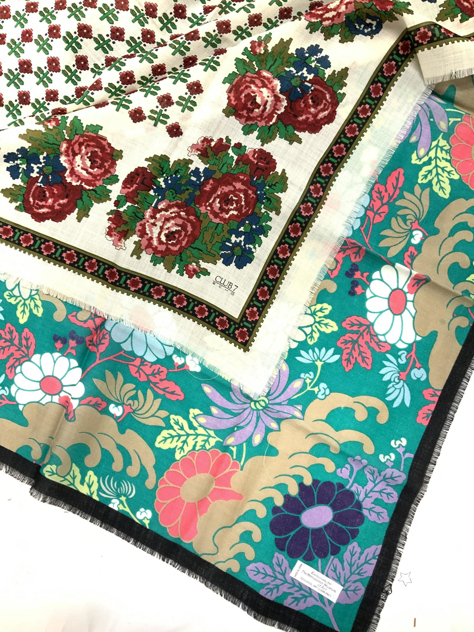 Lot 2 Fashion Scarves, MET Museum, Echo Wool: Singed labels for Echo club 7 and Metropolitan Museum of Art , 100% wool, crane toned with red roses and flower, black and green floral ( couple of punctures. 31 in. & 34 in. Square. Ladies wearables 