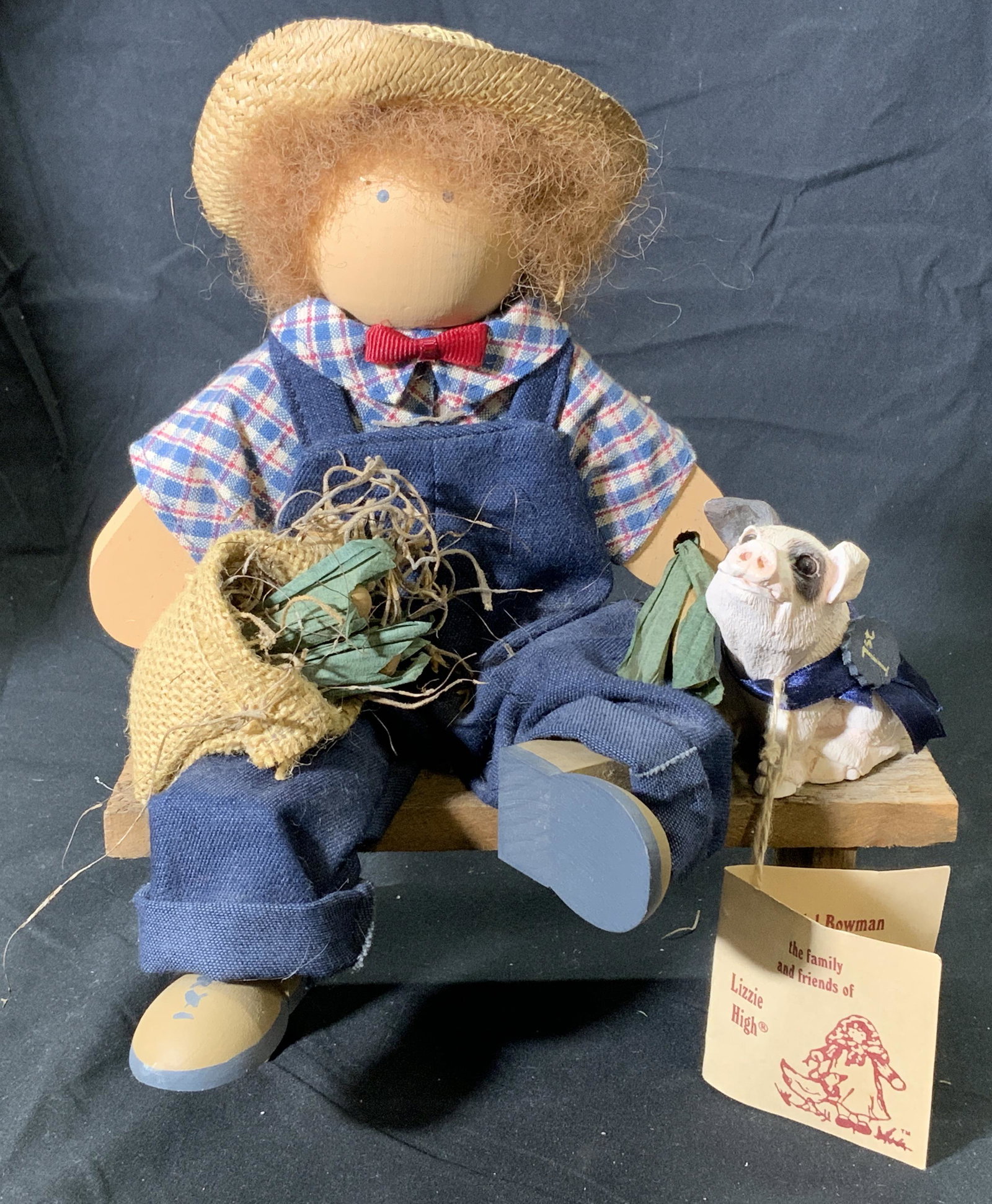 LIZZIE HIGH Handcrafted Folk Art Farmer Doll: LIZZIE HIGH handcrafted folk art wood doll. Farmer and pet pig on bench, doll not attached to bench. Original tag reads WENDEL BOWMAN second edition. Vintage from 1992. Signed by artists to tag. Previ