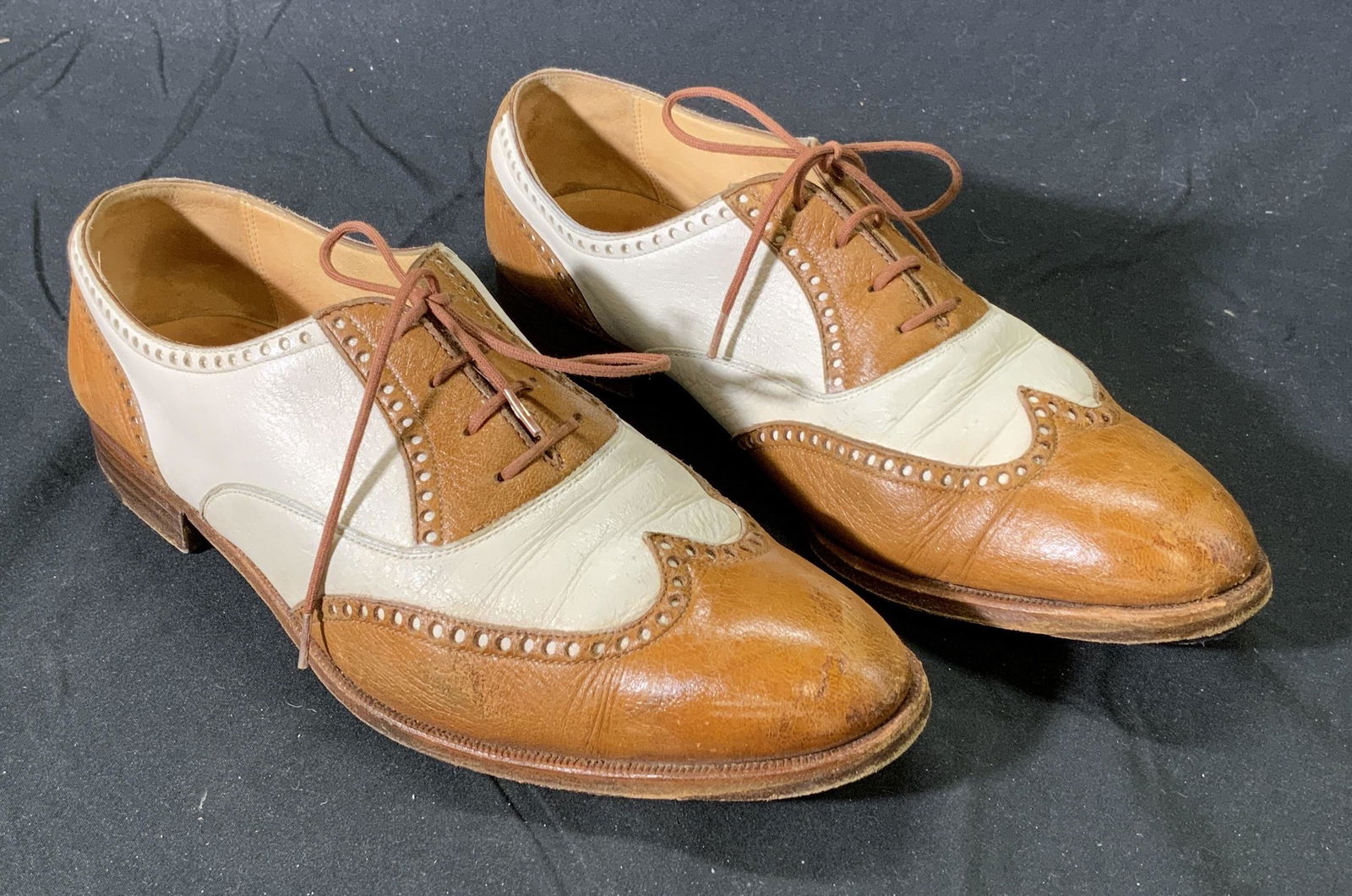 GRAVATI Tan & White Leather Oxfords: GRAVATI leather lace up Oxford shoes in tan and white. Size 9. Made in Italy. Wear consistent with use and exposure. Property of Manhattan, NY Estate. GRAVATI, Italian leather shoes, Italian designer
