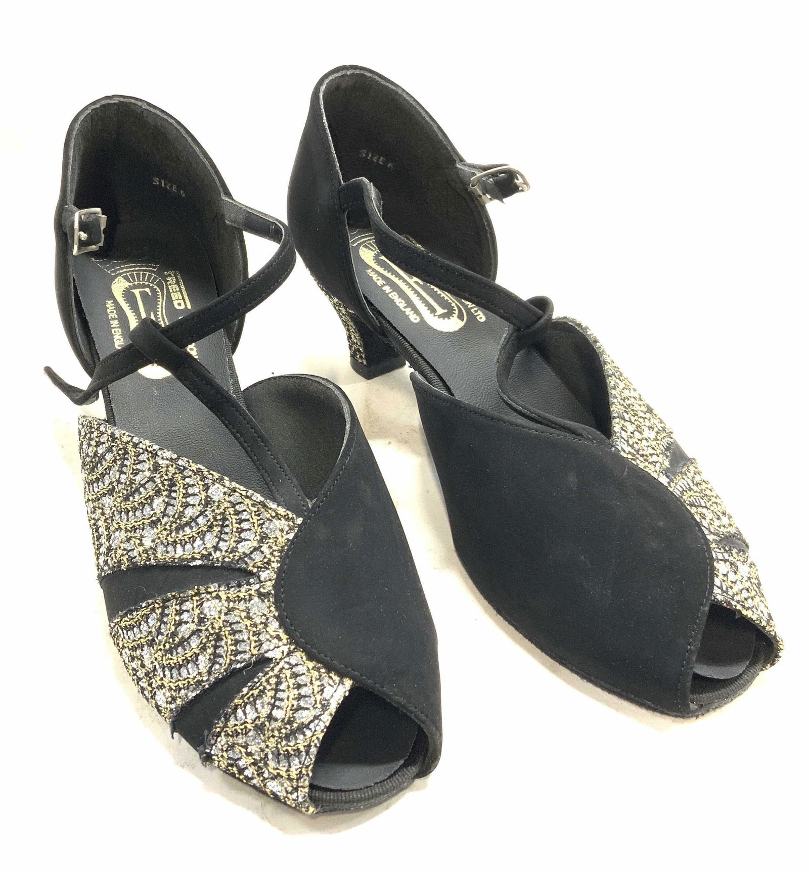 FREED LONDON Metallic Sequin Peep Toe Heels: FREED LONDON metallic sequin and gold thread peep toe heels with ankle strap in black. Size 6. Heel height approx. 1.5 inches. Unknown upper material, suede outsole. Wear consistent with use. Made in