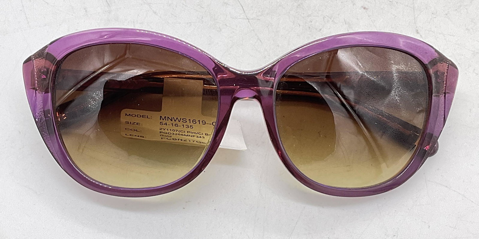 NWT 9W Purple Toned Sunglasses: NWT 9W Purple Toned Sunglasses. Up cycle to prescription pair of sunglasses or glasses. Surface wear to pieces consistent with age and use. Measures lens 2 inches and ear piece approx 5.5 inches. sung