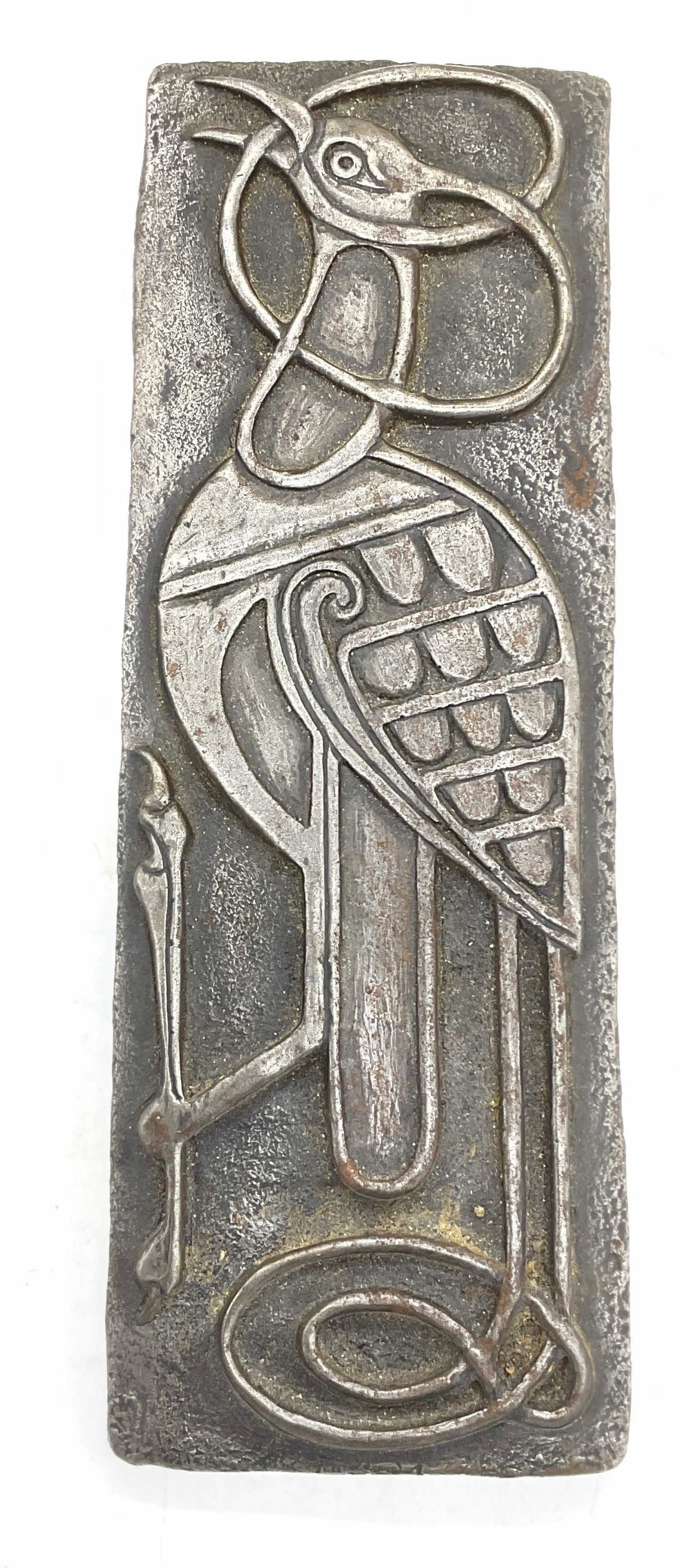 Irish Silver Toned Bird Wall Hanging, Ireland: Irish Silver Toned Bird Wall Hanging. Made of composite material. Label to back with description. Designed by Irish Artist Kathleen Smyth. Measures approx 12.5 x 3.5 inches. Some surface wear to piece