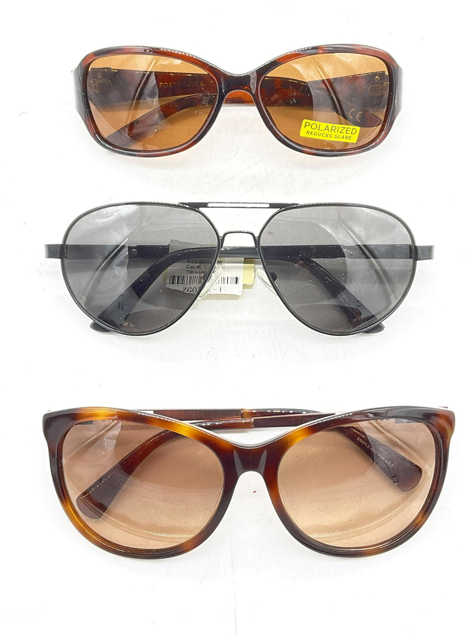 Lot 3 Sunglasses, Cole Hahn & More: Lot 3 Sunglasses. Up cycle to prescription pair of sunglasses or glasses. Surface wear to pieces consistent with age and use. Largest measures, lens 2.25 inches and ear piece approx 5.25 inches. sungl