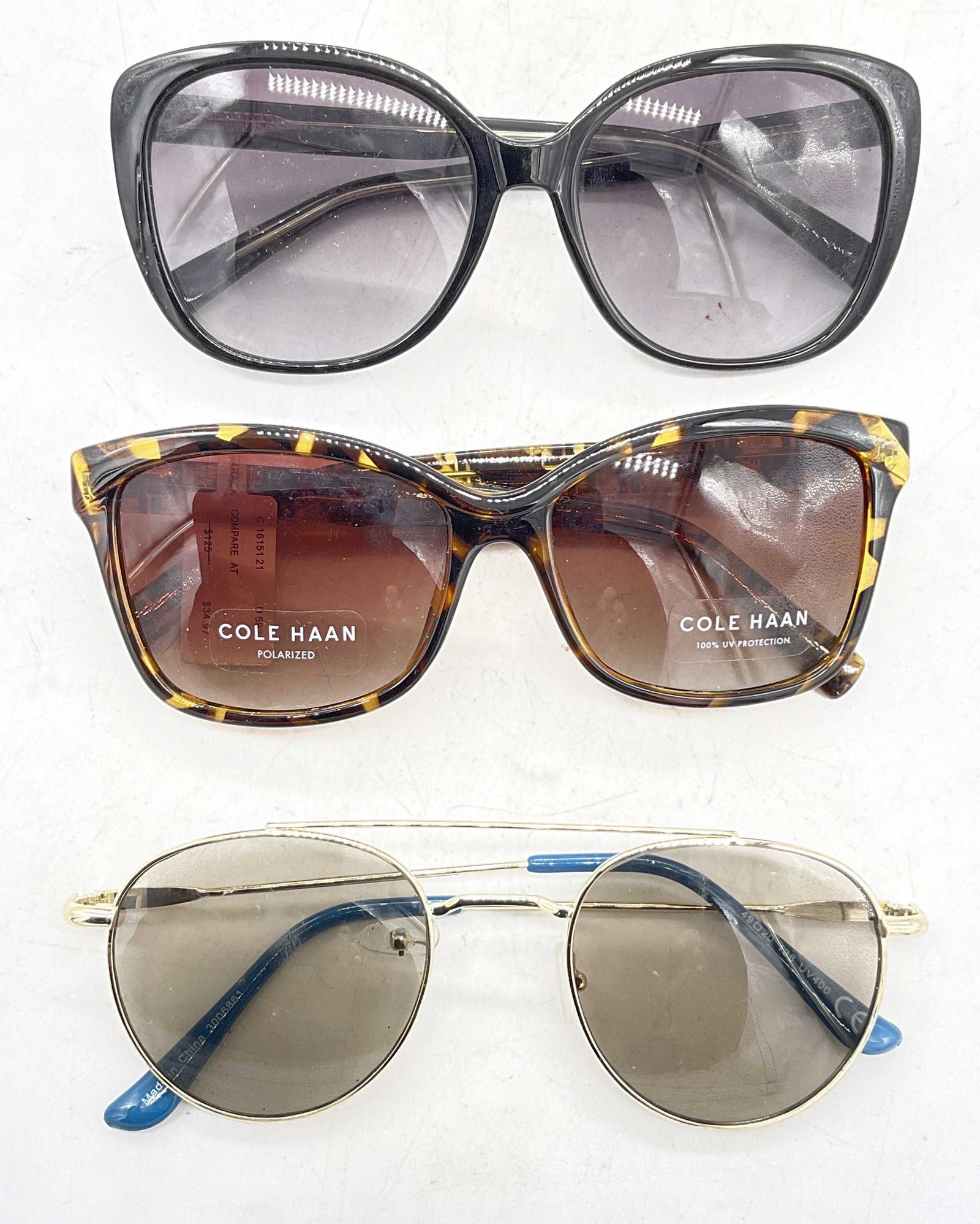 Lot 3 Sunglasses Calvin Klein & More: Lot 3 Sunglasses. Up cycle to prescription pair of sunglasses or glasses. Surface wear to pieces consistent with age and use. Largest measures, lens 2.25 inches and ear piece approx 5.5 inches. sungla