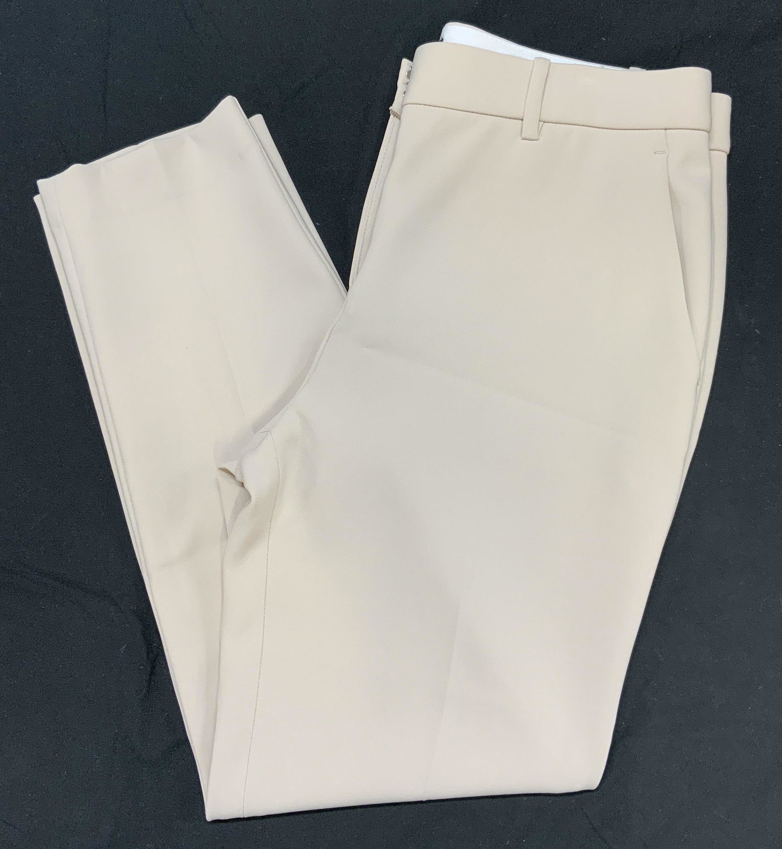 THEORY Beige Straight Leg Trousers: Theory straight leg pleated trouser in beige, size 6. 26 inch inseam. Belt loops, front zip and button, pockets to front and back. Triacetate and polyester blend. Possibly never worn. Theory, theory p