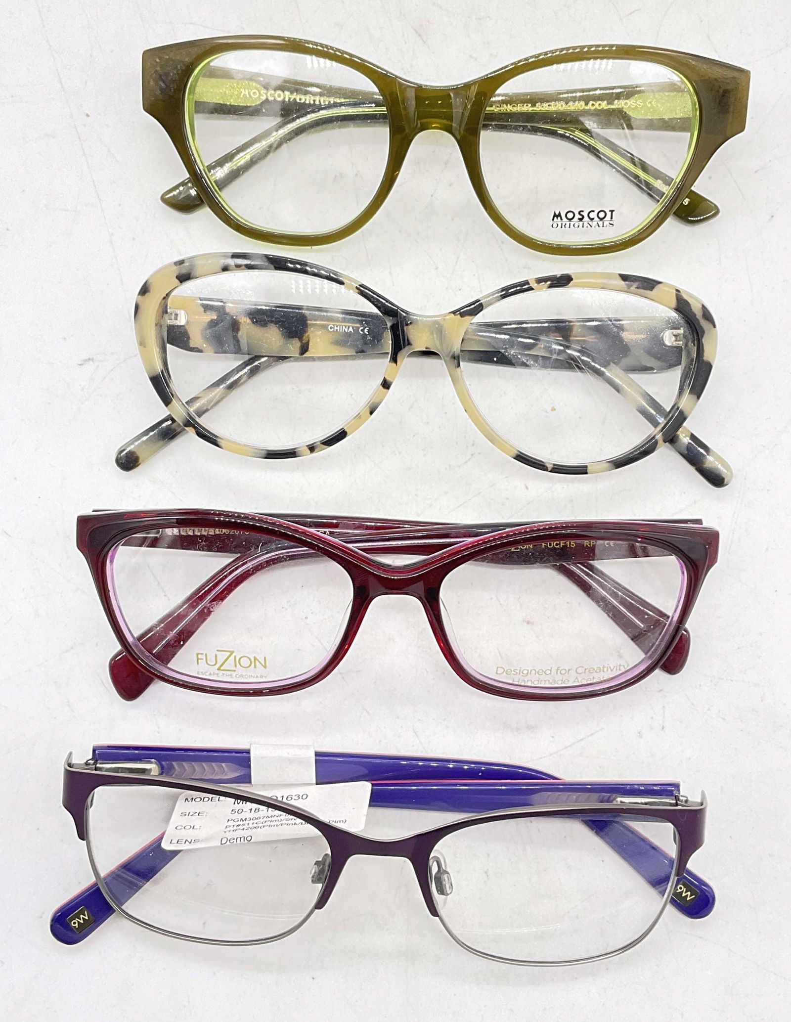 Lot 4 Eyeglasses, Moscot, 9W & More: Lot 4 Eyeglasses. Up cycle to prescription pair of sunglasses or glasses. Surface wear to pieces consistent with age and use. Largest measures, lens 2 inches and ear piece approx 5 inches. Eyeglasses,