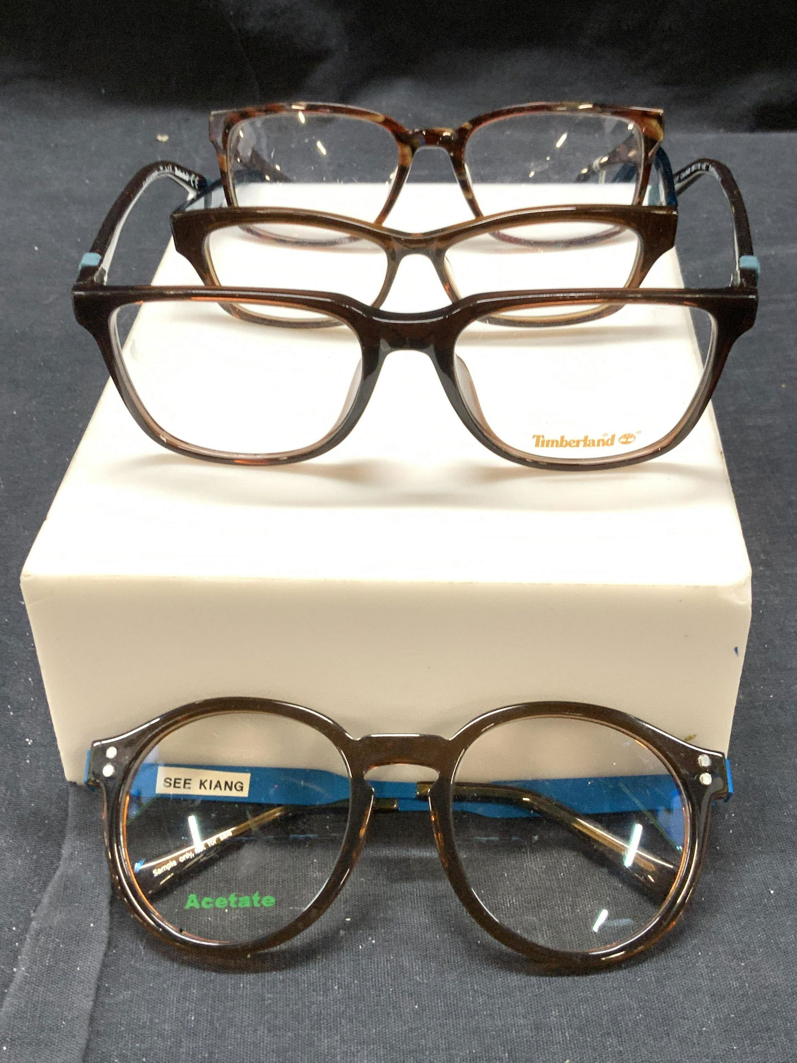 Lot 4 Designer Brand Eyeglasses, Sgn.: Acetate Sample Eyeglasses . Some with brand name on lenses. Designers Include Timberland, Juicy Couture, See Kiang, and Calvin Klein. Eyewear, Eyeglasses, wearable accessories, Wearble fashion accesso