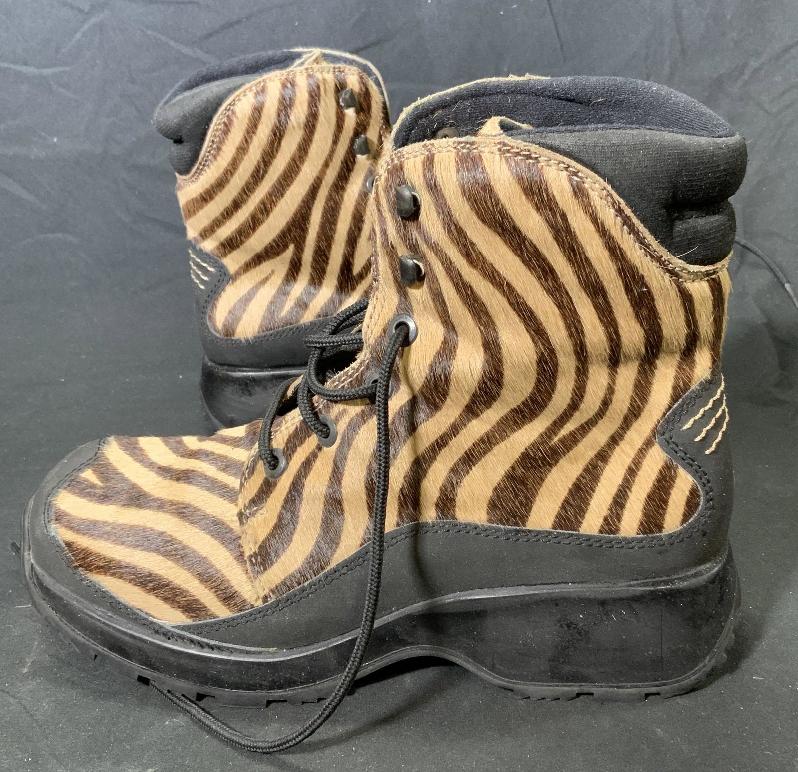 TECNICA Beige Animal Print Winter Boots Italy: TECNICA animal print boots in beige. Size 9. Wear consistent with use. Made in Italy. Property of Manhattan, NY Estate. TECNICA, ladies boots, ladies winter boots, ladies animal print boots, calf hair