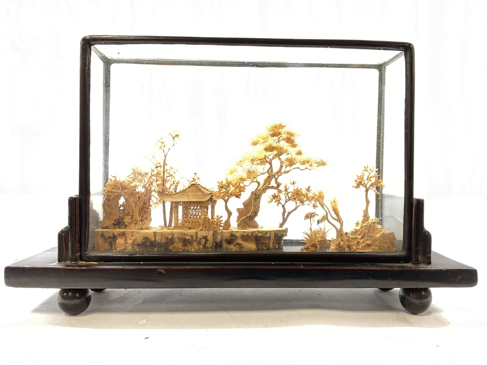 Chinese Micro Carved Cork Landscape: Chinese Micro Carved Cork Landscape. Glass cover comes off. Not attached. Measures approx 10 x 6 inches. Surface wear to piece consistent with age and use. Some Cork pieces are broken. Glass is cracki