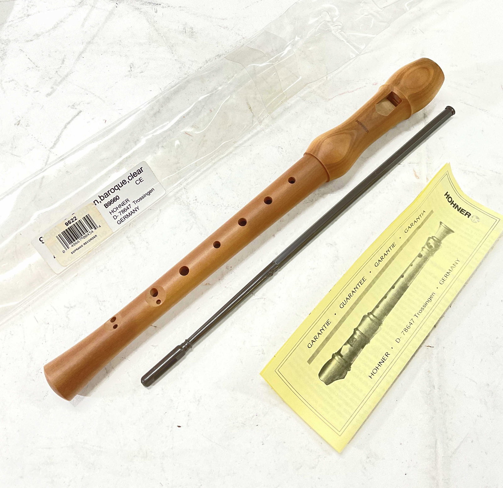 Hohner Wooden Soprano Recorder, Germany: Hohner Wooden Soprano Recorder, Germany. Care to piece comes in protective sleeve and rod to help oil inside of instrument. Measures approx 13 inches long. Surface wear to protective sleeve. Recorder,