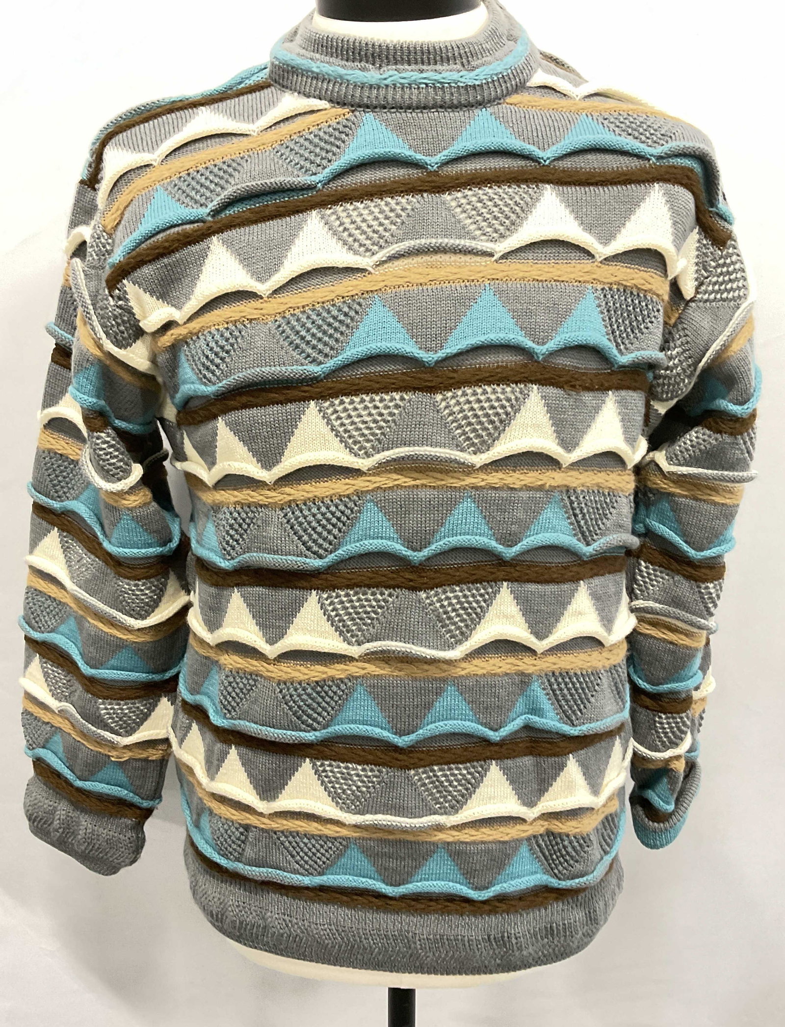 Vintage COOGI Knit Sweater, Australia: Vintage 100% Pure New Wool knit sweater with colored textured textiles in light blue & Beige tones. Designer tag marked COOGI Australia, size M, made in Australia. COOGI knit sweater, COOGI wool sweat