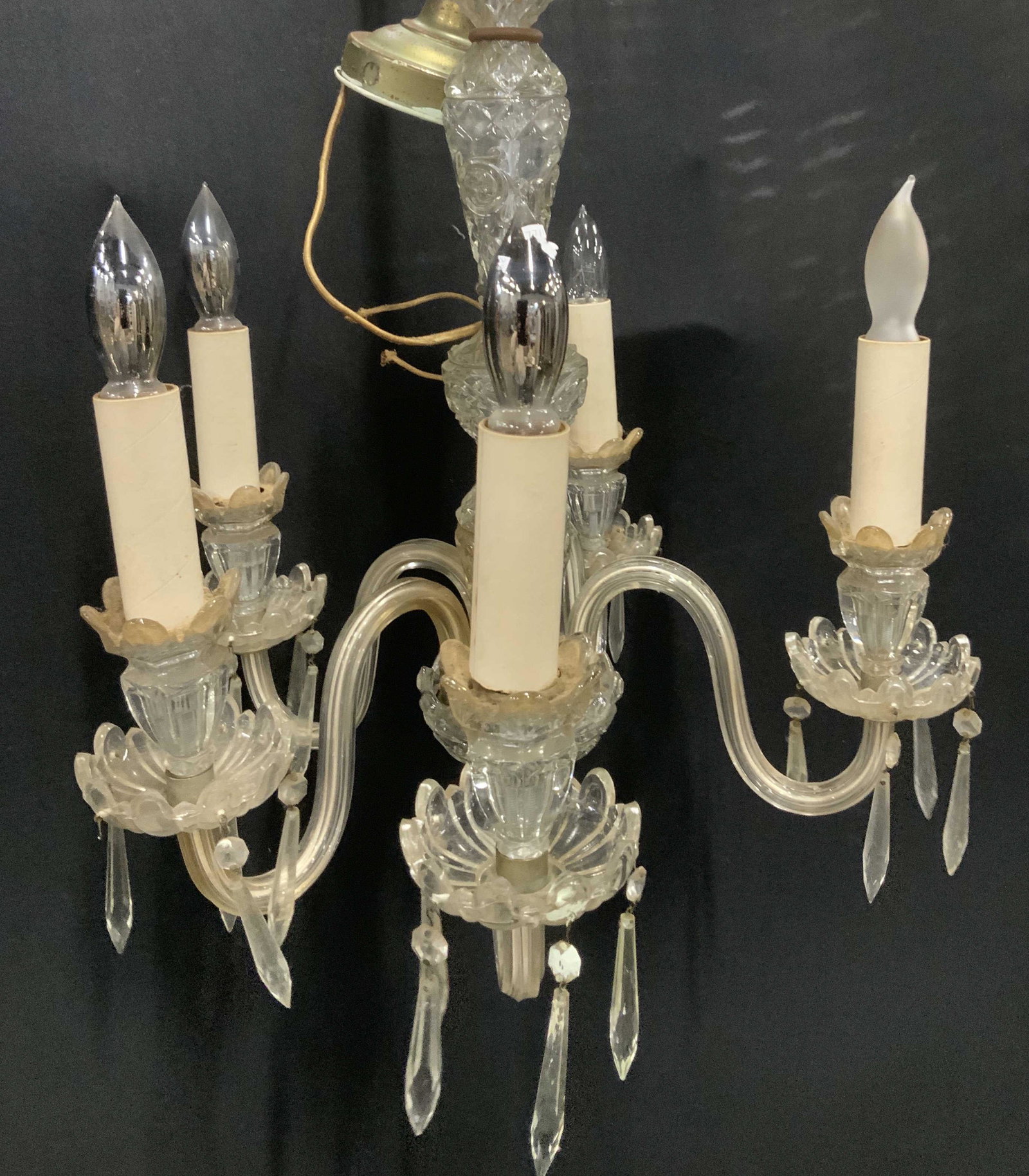 Victorian Embossed Glass Chandelier: Vintage 5 arm chandelier ( 1 arm missing ) . Embossed molded glass with diamond shape features. Bobeches and glass prisms. Upper bobeche needs replacement. Chandelier style bulbs. Possibly dates to 19