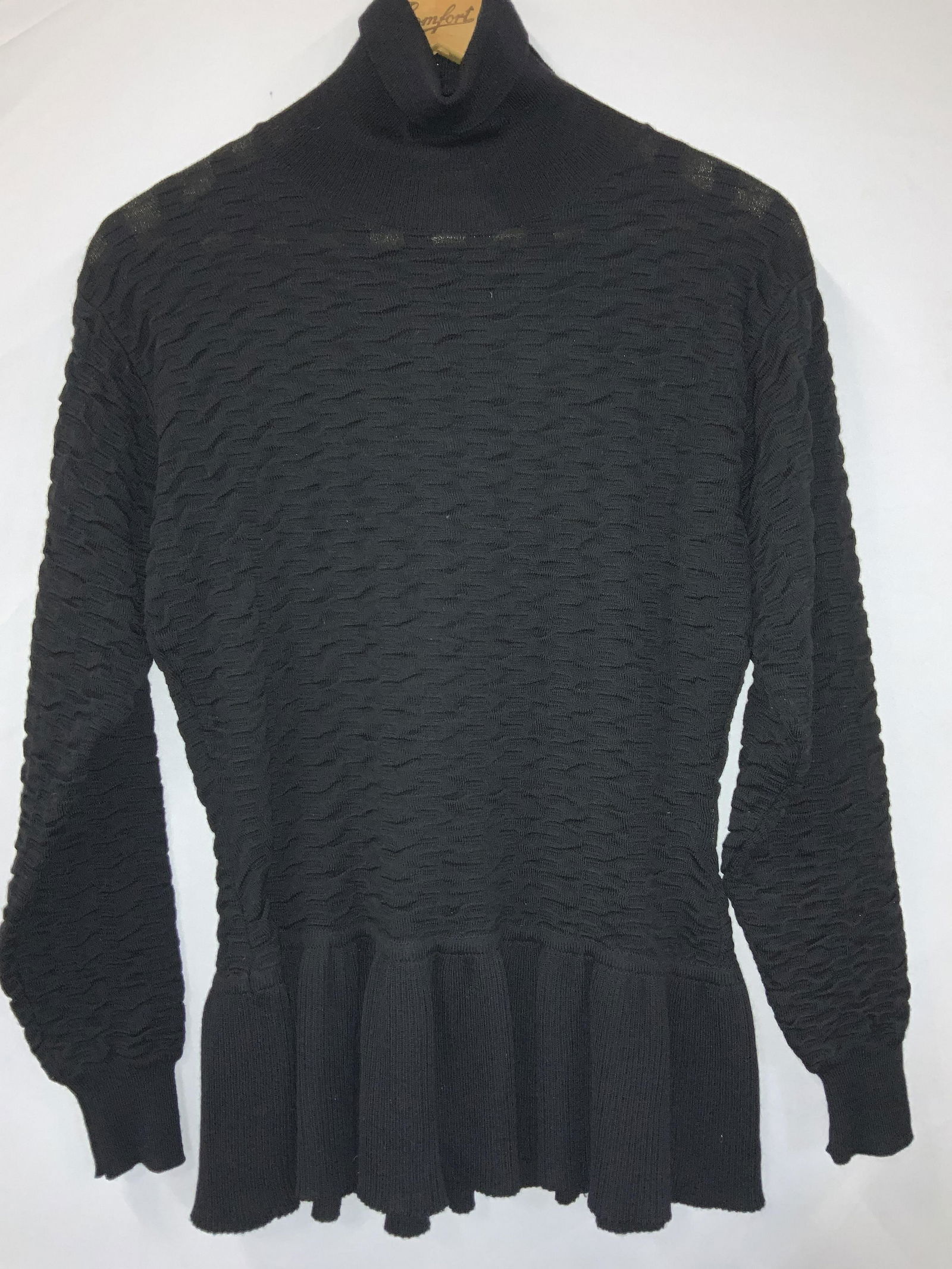 MOSCHINO Italian Wool Turtleneck, Sgn: MOSCHINO Milano Italian wool turtleneck with textured pattern. Size 42, made in Italy. Ruffle lower hem. Vintage wear, Estate Wear, Signed designer MOSCHINO , Made in Milano Italy, Ladies luxury desig