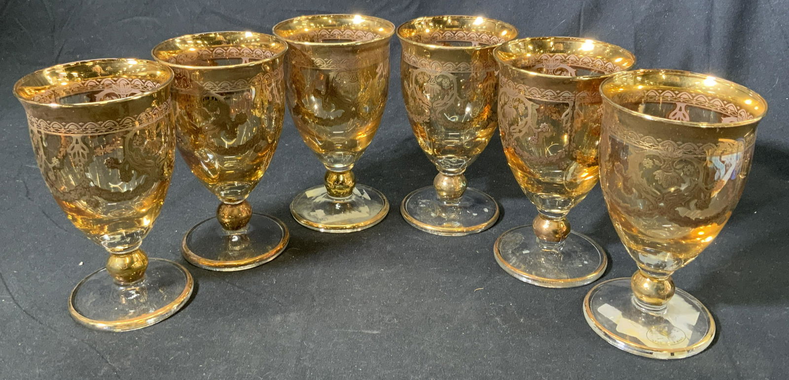 Set 6 J PREZIOSI Gilt Goblet Glassware, Italy: Set of 6 J PREZIOSI ornately decorated gilt glass goblets. Measure approx. 3 inches diameter and 5.25 inches tall. Condition consistent with age and exposure, some scratching. Sticker to base of glass