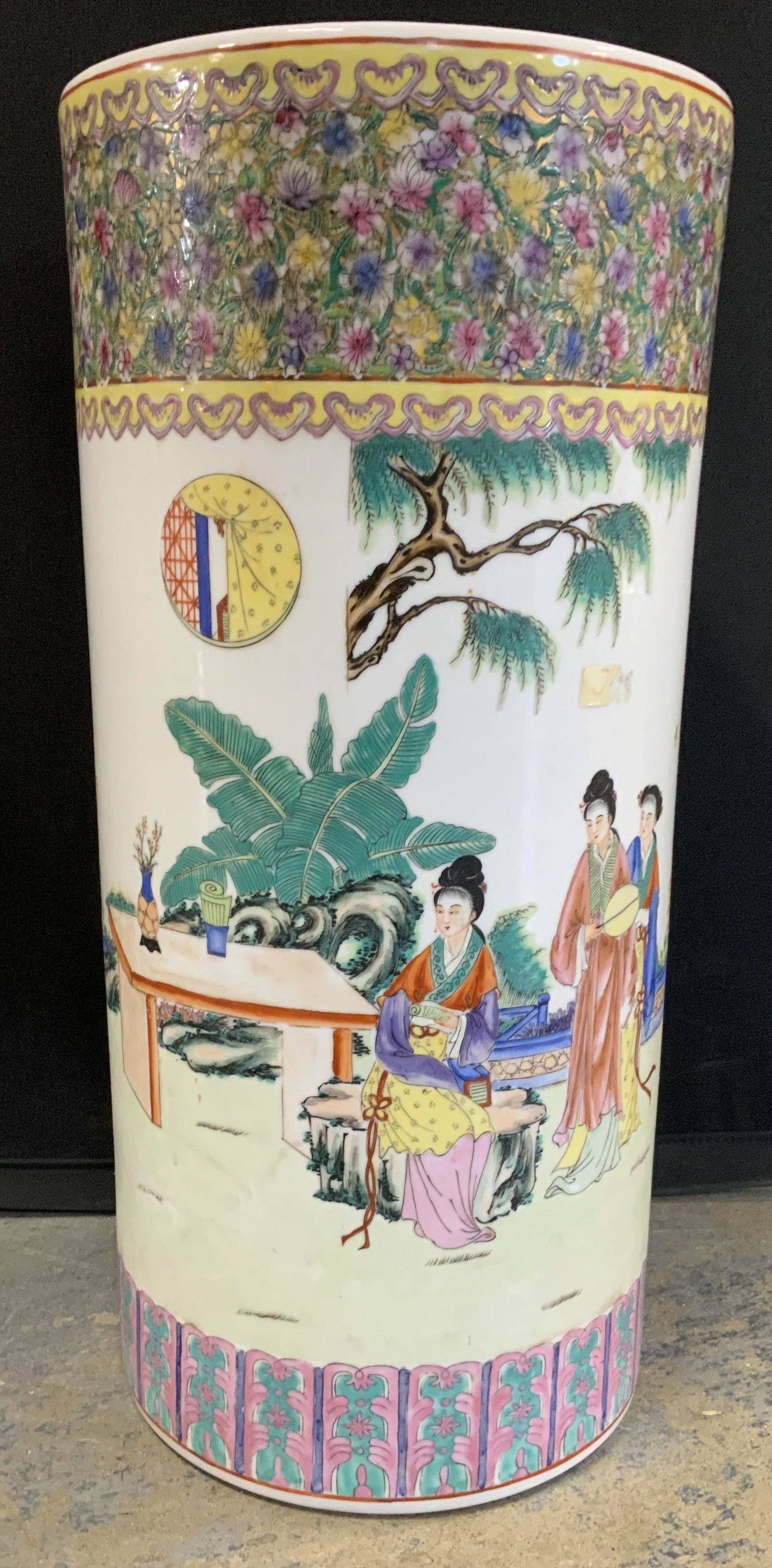 YT Japanese Porcelain Umbrella Stand, HK,18.25 in.: SIGNED Asian Porcelain Umbrella stand/ Jardiniere. Underside is stamped in orange ink , reads ‘Y.T. Japanese Porcelain Wares Hand Decorated in Hong Kong’. 18.25 in ht, 8 in. diameter, chintz flora