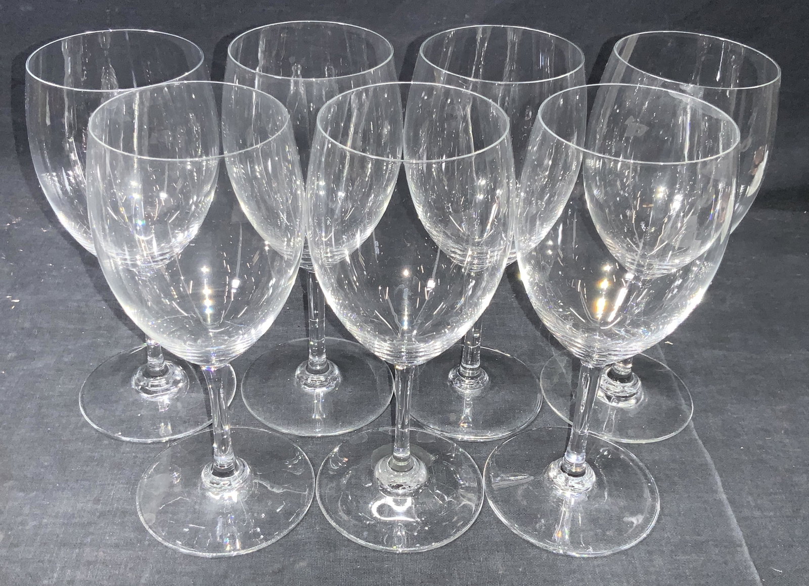 7 BACCARAT Signed Crystal Stemware Glasses, France: Set of 7 crystal baccarat wine glasses. Marked Baccarat, France on undersides. Approximately 6.75 inches tall. Baccarat Crystal stemware, stemware, crystal stemware, crystal wine glasses, wine glasses