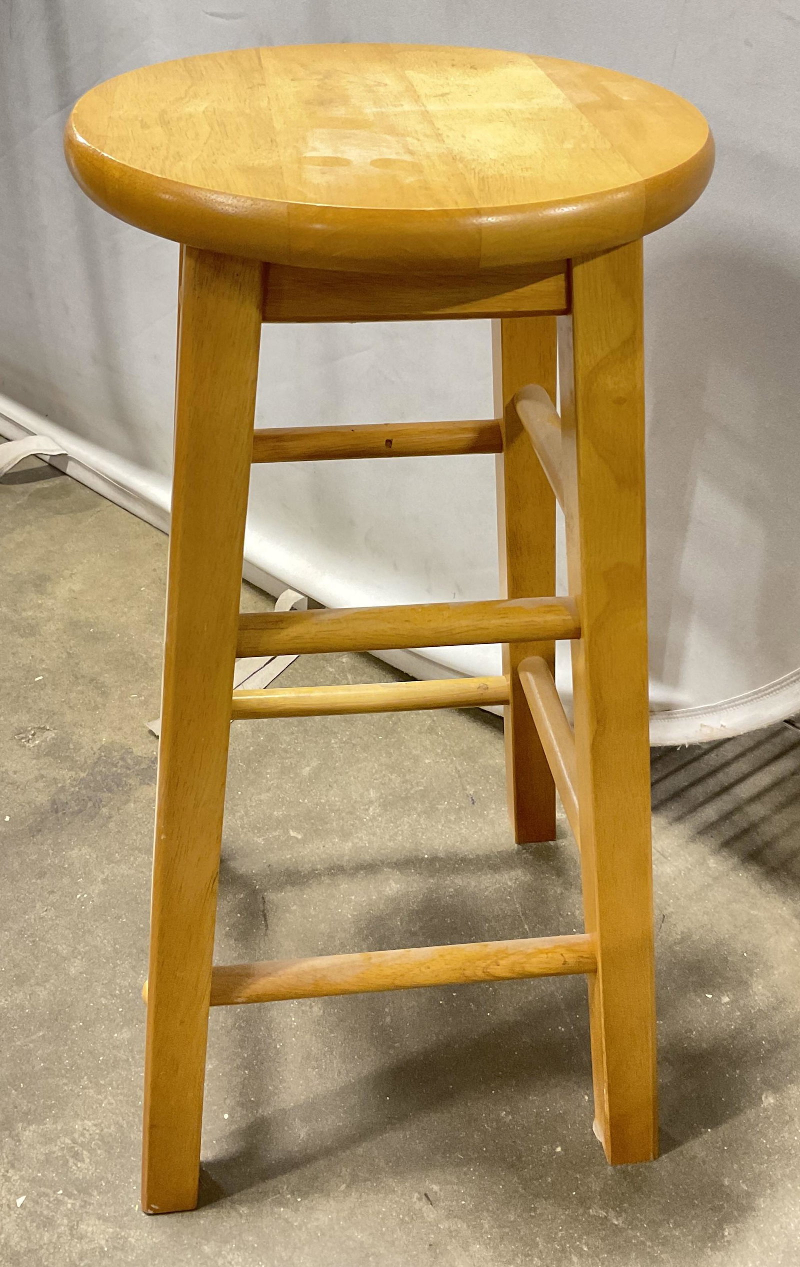 Round Top Wooden Stool: Round top wooden stool. Light colored wood. Measures approx 24H x 12W inches, wear to piece consistent with age and use, slight wobble to piece. Stool, wooden stool, counter stool, Art stool, furnitur