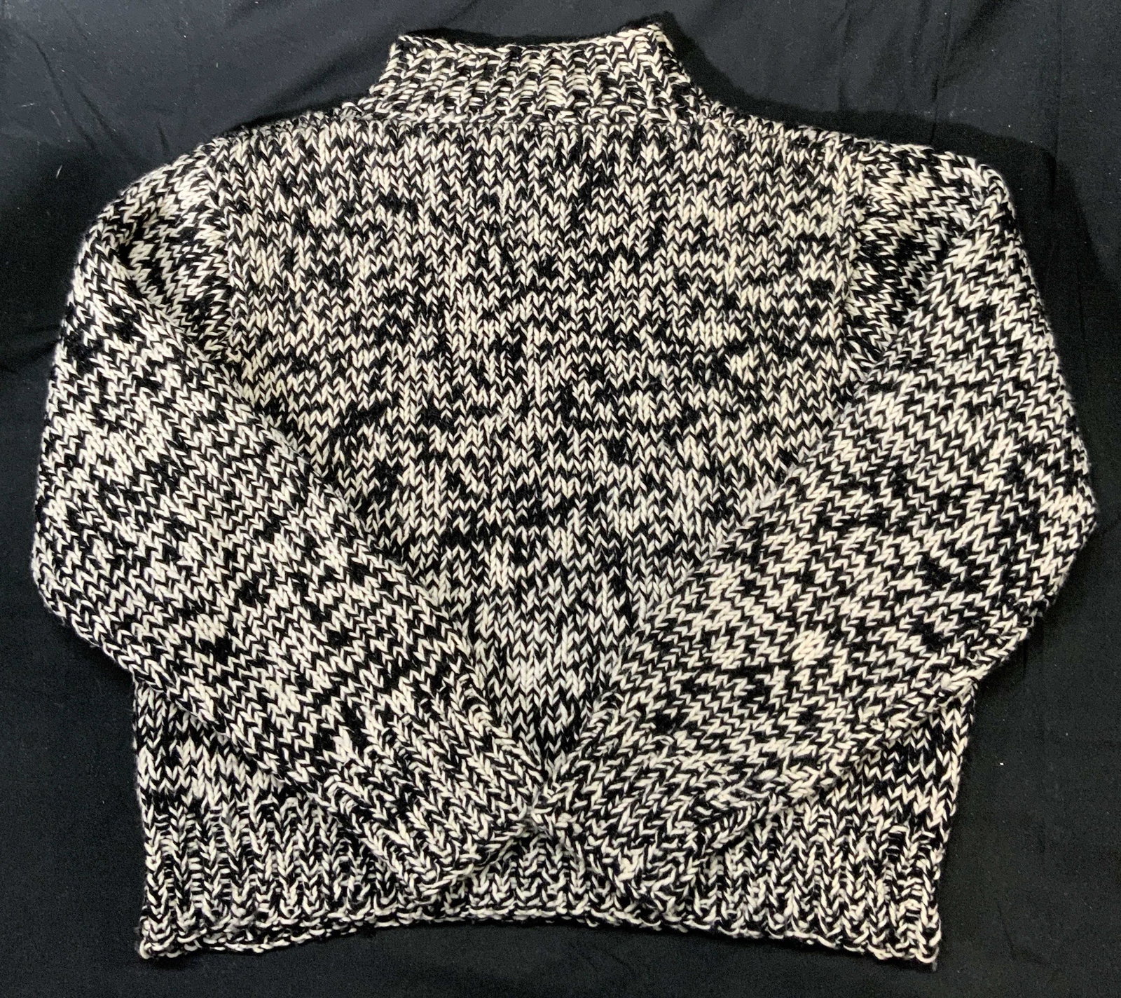 Unlabeled Designer Chunky Knit Black White Sweater: Unlabeled designer chunky knit mock neck sweater in black and white. No size, measures approx. 20.5 inches across chest and 29 inches shoulder to hem. Gently worn. Ladies knitwear, ladies knit sweater