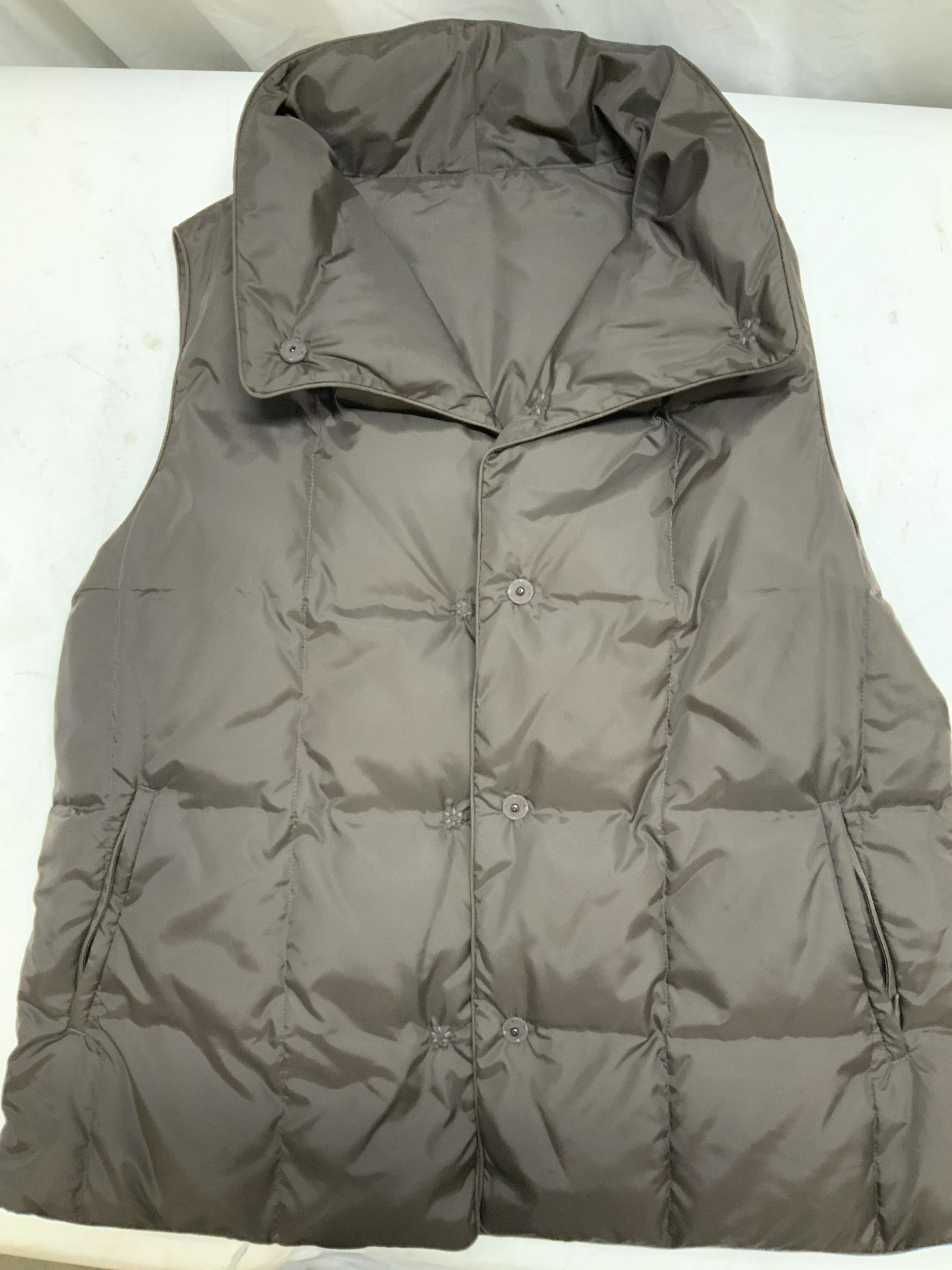 Unlabeled Feather Down Brown Puffer Vest: Possibly never worn vest, brown, reversible vest, both sides with hand pockets, possibly down filling. A puffer vest for the outdoors. size large. 3 puffer Vest, Outerwear, Reversible Down Vest, Luxur