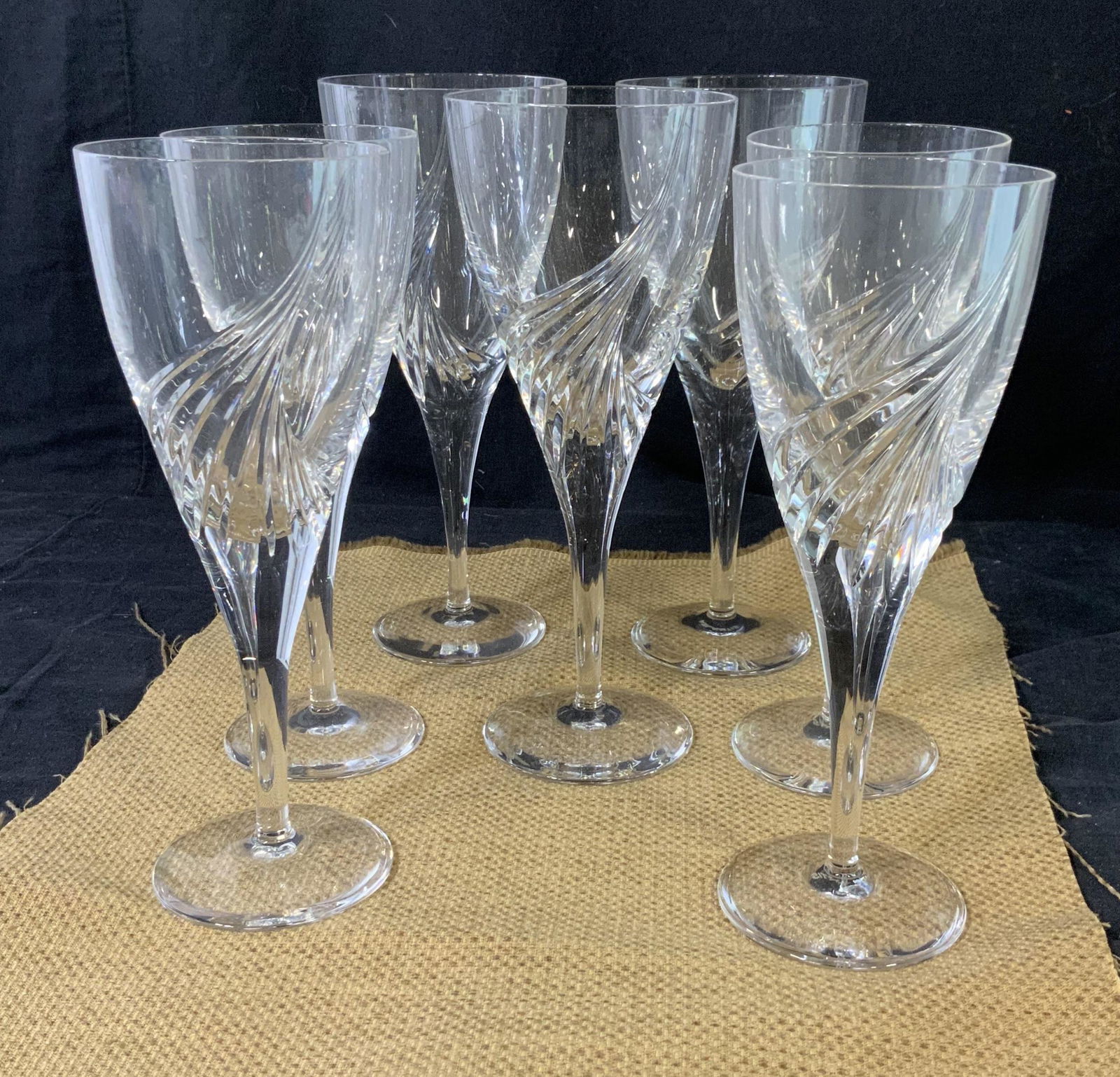 Set 7 Art Deco Hand Blown Lead Crystal Glasses,: Portugal. Vintage cut Crystal stemware set with Art Deco swirl design. Set 3 large glasses 8.5 x 3.5 in. Set 4 smaller size 7.5 x 2.3/4 in. These come in the original box marked ‘Atlantis Hand Blown
