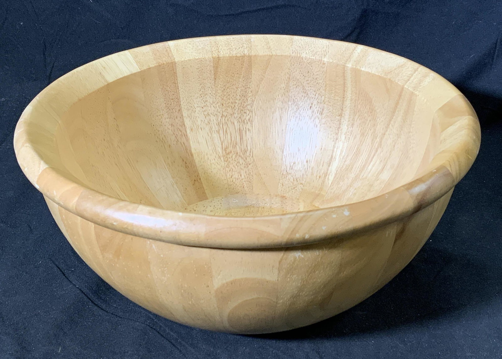 Vintage Light Wood Serving Bowl: A vintage light wood serving bowl. Measures approx. 12.5 inches diameter and 5.75 inches tall. Surface wear consistent with age, use, and exposure. Wood bowl, serving bowl, serve ware, tableware, kitc