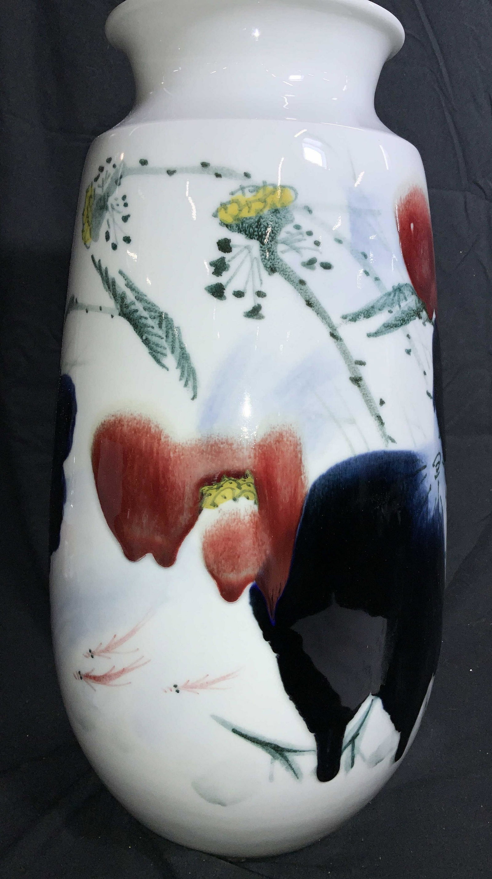 Oversized Tabletop Porcelain Art Vessel/ Vase: Hand painted Artisanal Porcelain Vase, hand painted and glazed, depicts Asian style florals, minimalist, red, blue and yellow flowers on white background. No signature, measures 9 in. Wide, 16.5 in. H