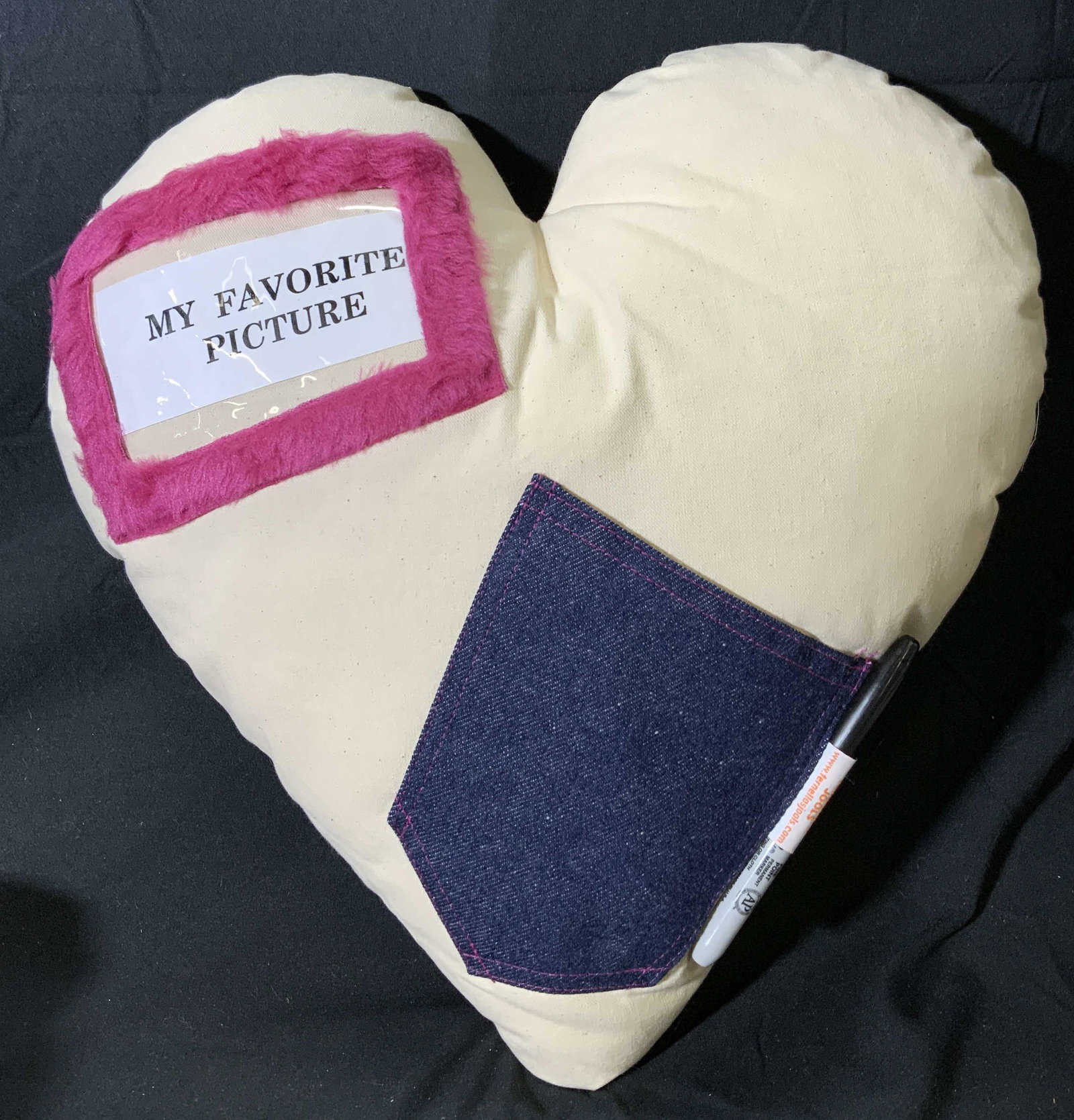 Vintage Heart Camo Print Drawing Pillow: A vintage heart shaped fabric pillow with camo print to back, denim pocket, slip pocket with clear window for pictures. In good condition. Measures approx. 17 x 16 inches. Pillow, throw pillow, drawin