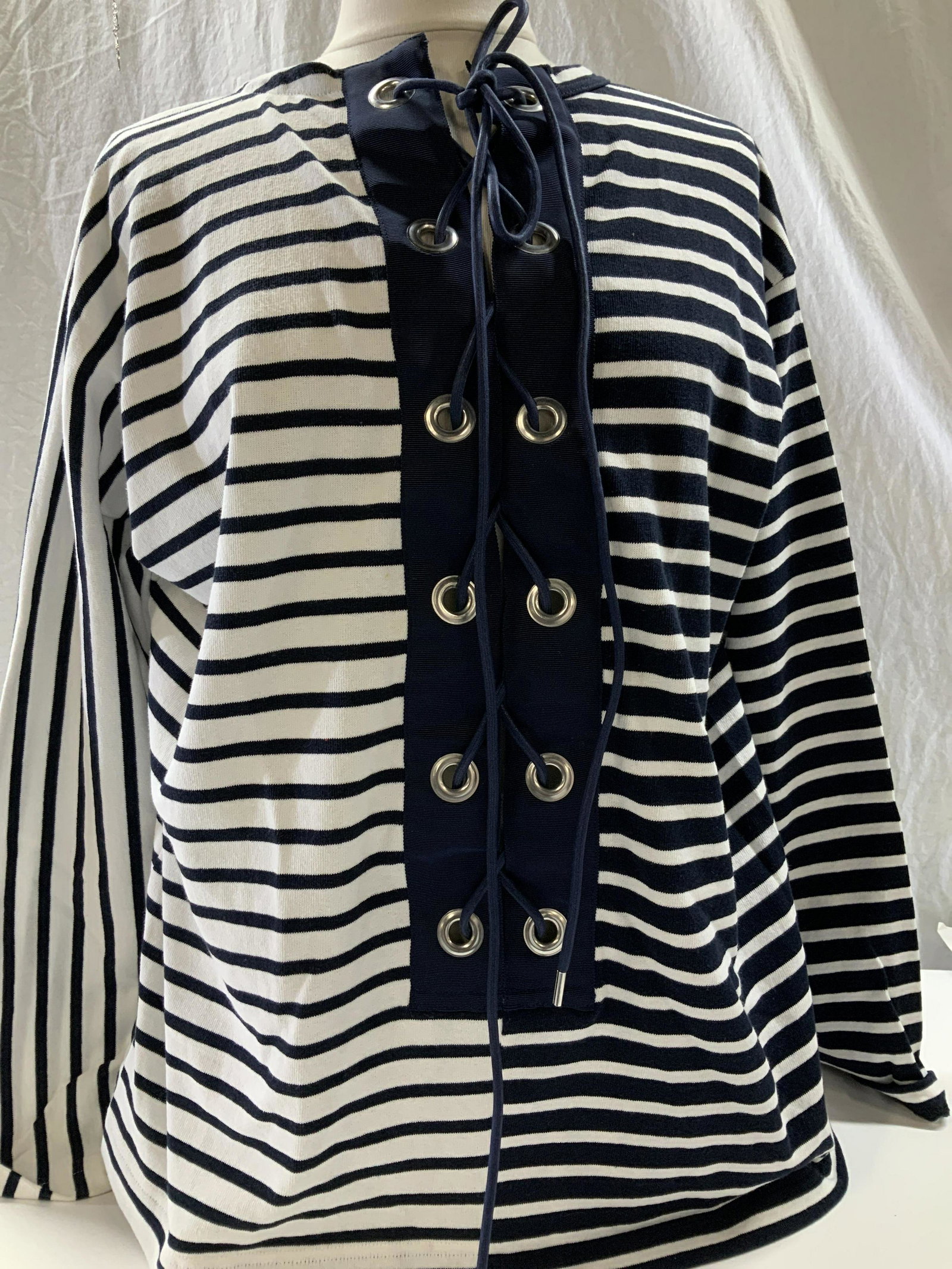Sacai Heavy Combed Cotton Nautical Shirt: Horizontal navy and white stripped combed cotton shirt, long sleeves, grommet and rope closure accent, high crew collar. Size 44 in waist. Property of Manhattan, NY Estate Sacai Blue and white Striped