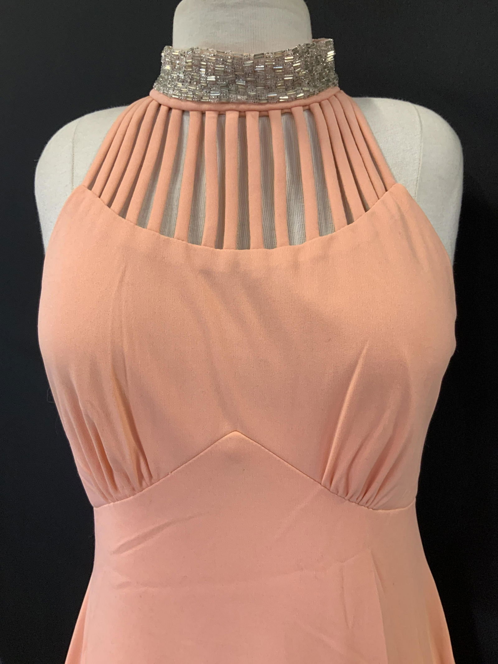 Beaded Halter Top Mid Century Cocktail Gown: Peach halter dress, vintage size 14. Halter neck with silver seed bead along collar. Feels like polyester. Collar 16.5 in. Lower Body of the dress is flowy , mid section is form fitting. Chest seem ac