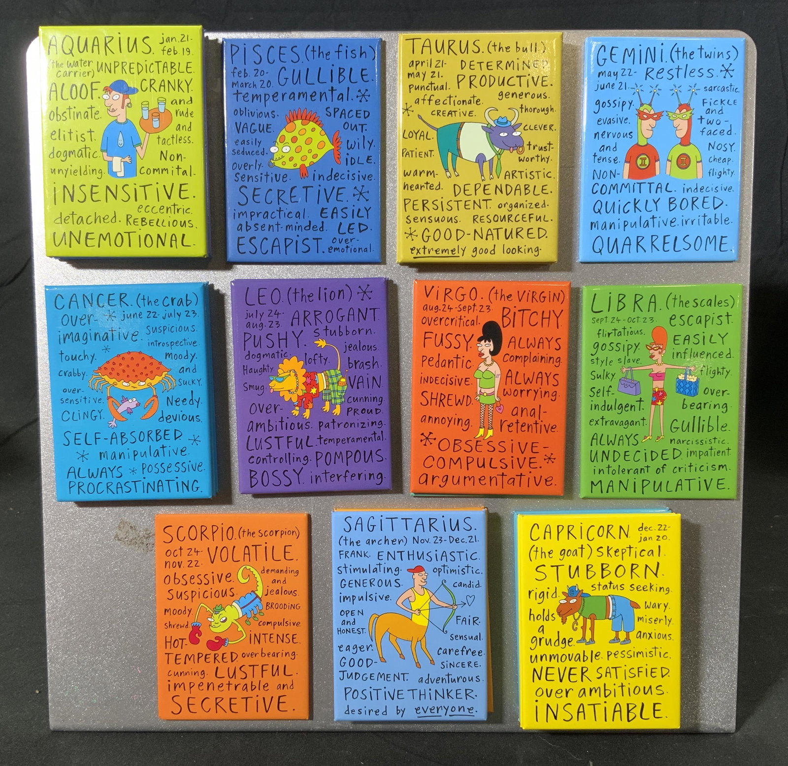 Assorted Vintage ZODIAC SIGN Magnets & Board: Assorted vintage zodiac sign magnets and steel magnet board. Includes, Aquarius, Pisces, Taurus, Gemini, Cancer, Leo, Virgo, Libra, Scorpio, Sagittarius, and Capricorn magnets. Magnets measure approx.