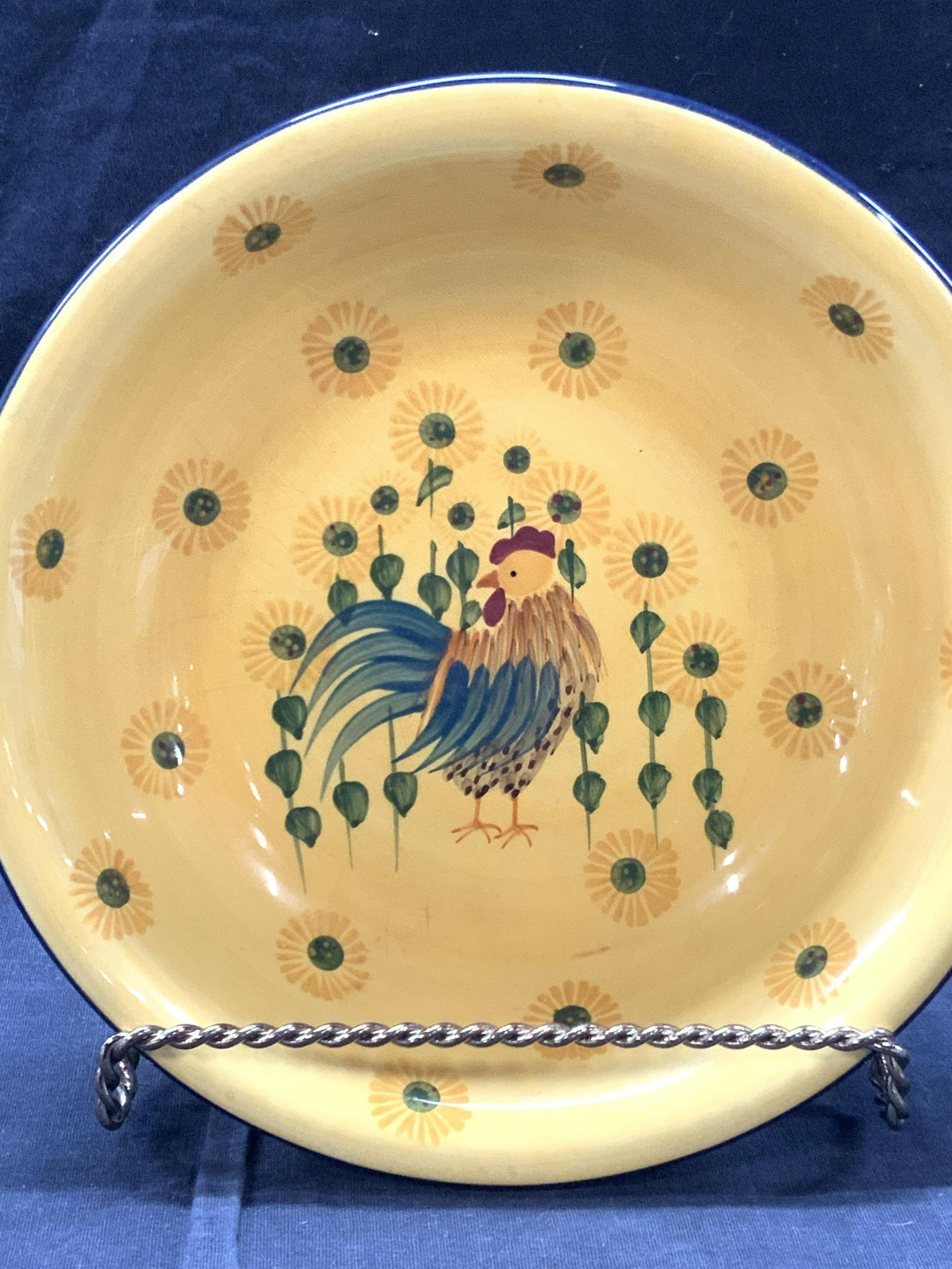 Pure Art Signed Arol Endres Ceramic Bowl: Signed on underside Arol Endres, ceramic bowl with hand painted motif of a chicken in the center of the bowl with blue painted rims. Marked on underside Pure Art. Approximately 2 inches tall and 8 inc