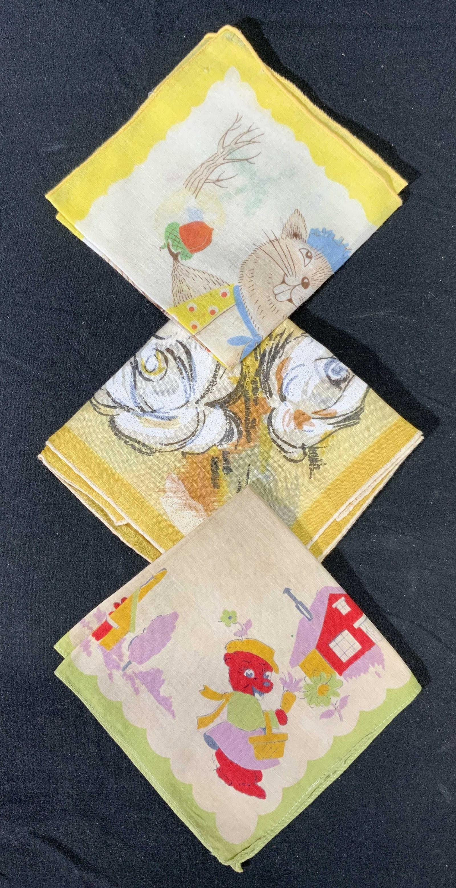 Lot 3 Vintage Hankies, Squirrel, Bears, Floral: Lot of 3 vintage hankies. 1 squirrel hankie in hues of yellow, blue, and green, measures approx. 8.25 x 8.5 inches. 1 bear hankie in hues of green, yellow, and red, measures approx. 8.75 x 8.75 inches