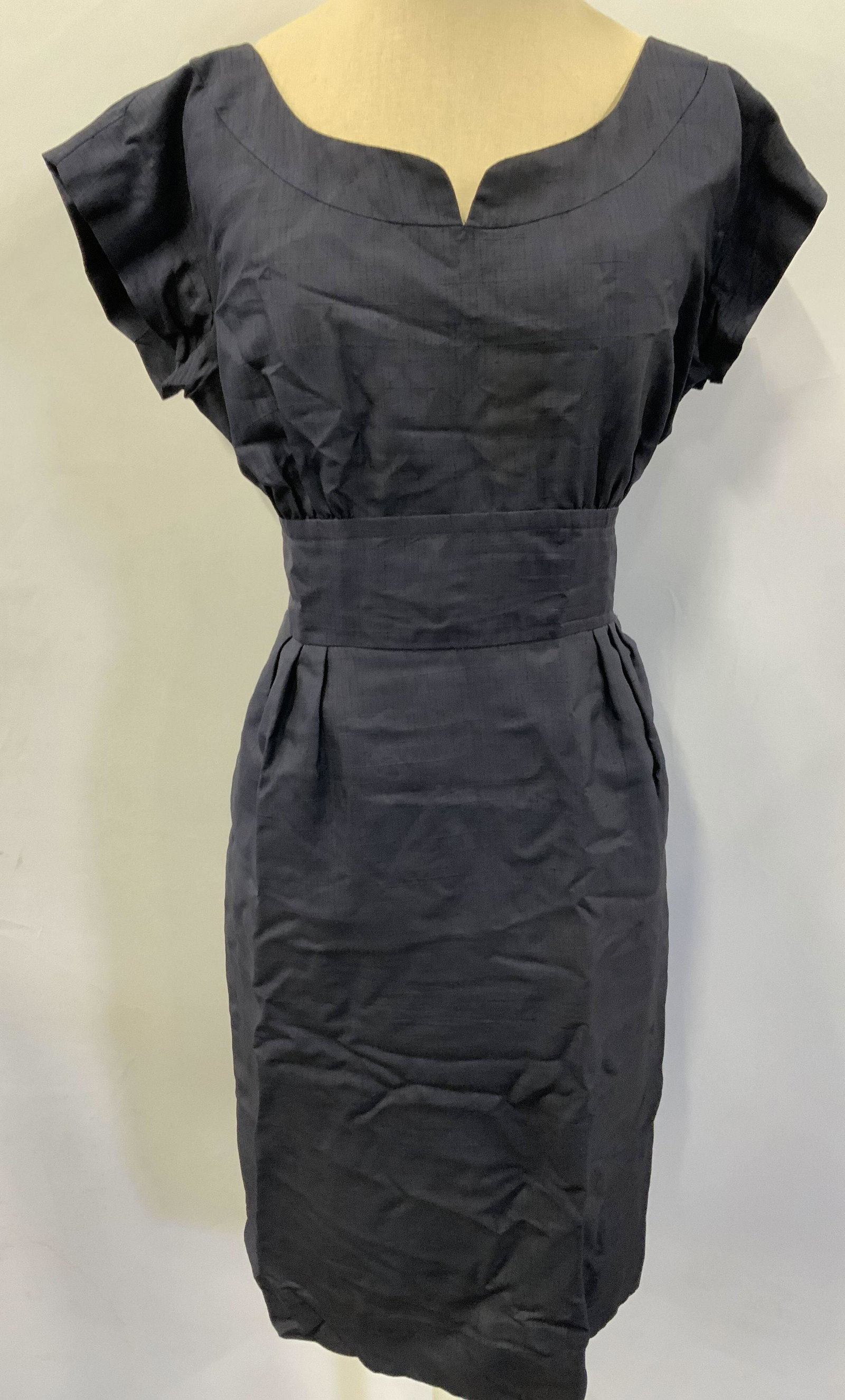 Vintage Custom Made Blue Silk Sheath Dress: Vintage custom made silk sheath dress in navy blue. Side zipper closure, belt loops, and pockets. Missing belt. Fabric has no stretch. No size, measures approx. 20 inches across bust and 40.5 inches f