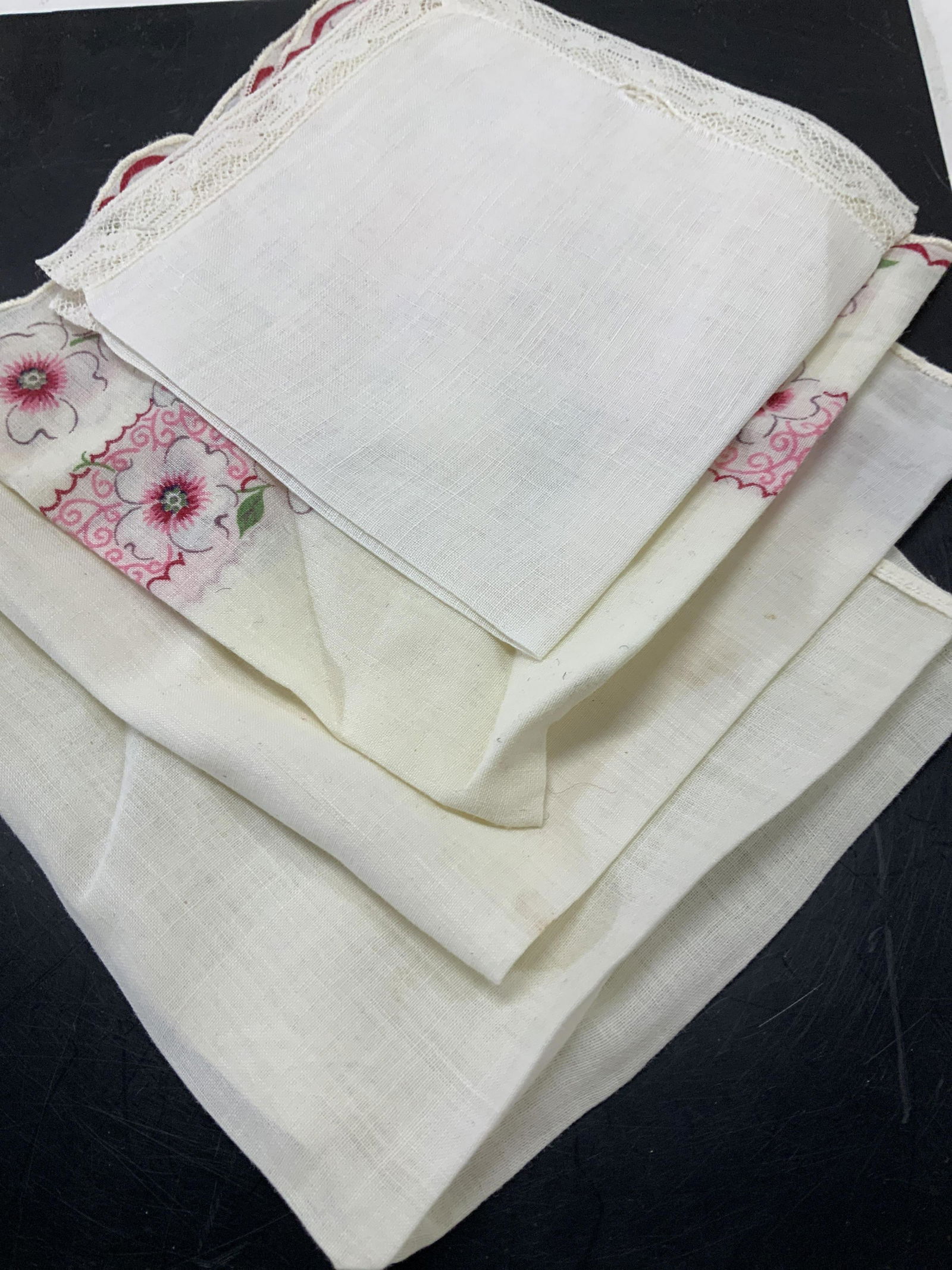 Lot4 Vintage Hand Embroidered Linen Hankies: Vintage linen hankies with corner flower embroidery or lace rim. 1 floral print. At least 2 has moderate wear with tears. Average size 10.75 x 10.75 in. Linens, Hand Embroidery , Embroidered vintage h