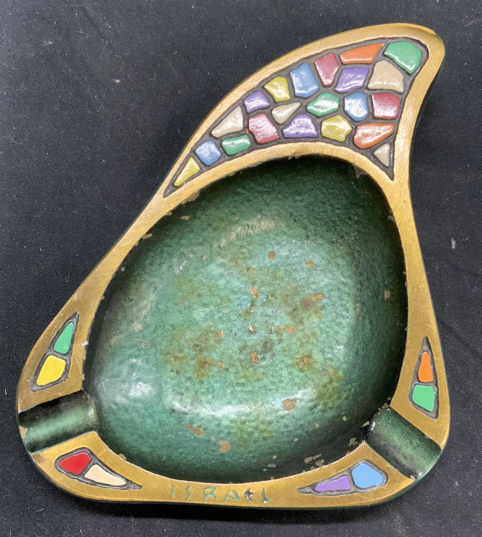 DAYAG Vintage Enameled Metal Mosaic Ashtray: DAYAG vintage enamel on metal astray with mosaic motif in hues of gold, green, blue, yellow, and red. Marked Israel to rim. Trademarked to underside. Made in Israel. Measures approx. 5.5 x 4.75 inches