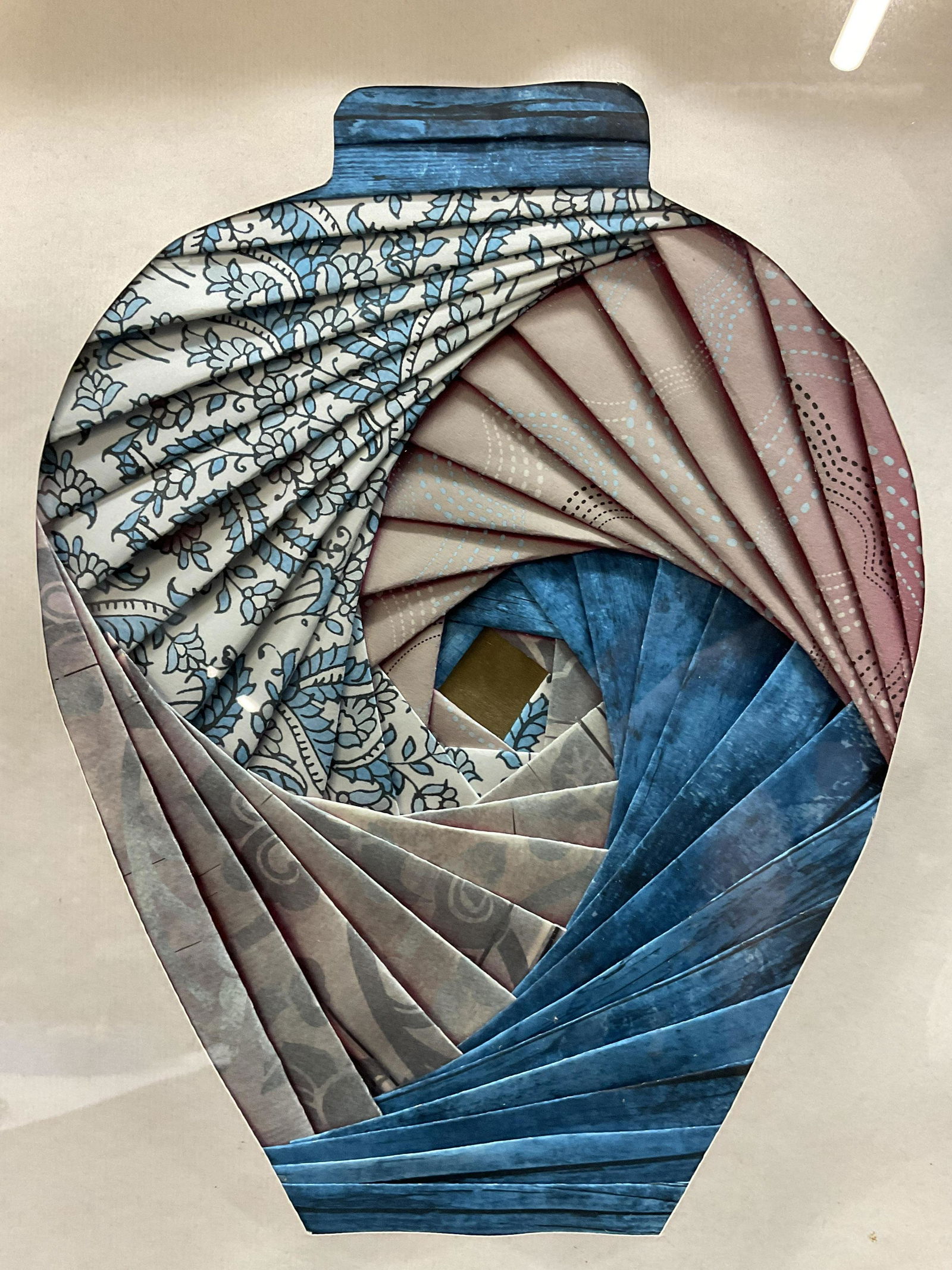 LORETTA Paper Collage Vase Artwork: LORETTA Paper Collage Vase Artwork, label to reverse reads ‘Designed and created by Loretta’, subject a silhouette of a vase composed of various printed and folded papers, black wooden frame, meas